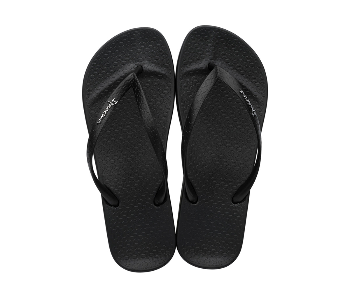 Top view of a pair of black Ipanema Ana Tan Flip flops.