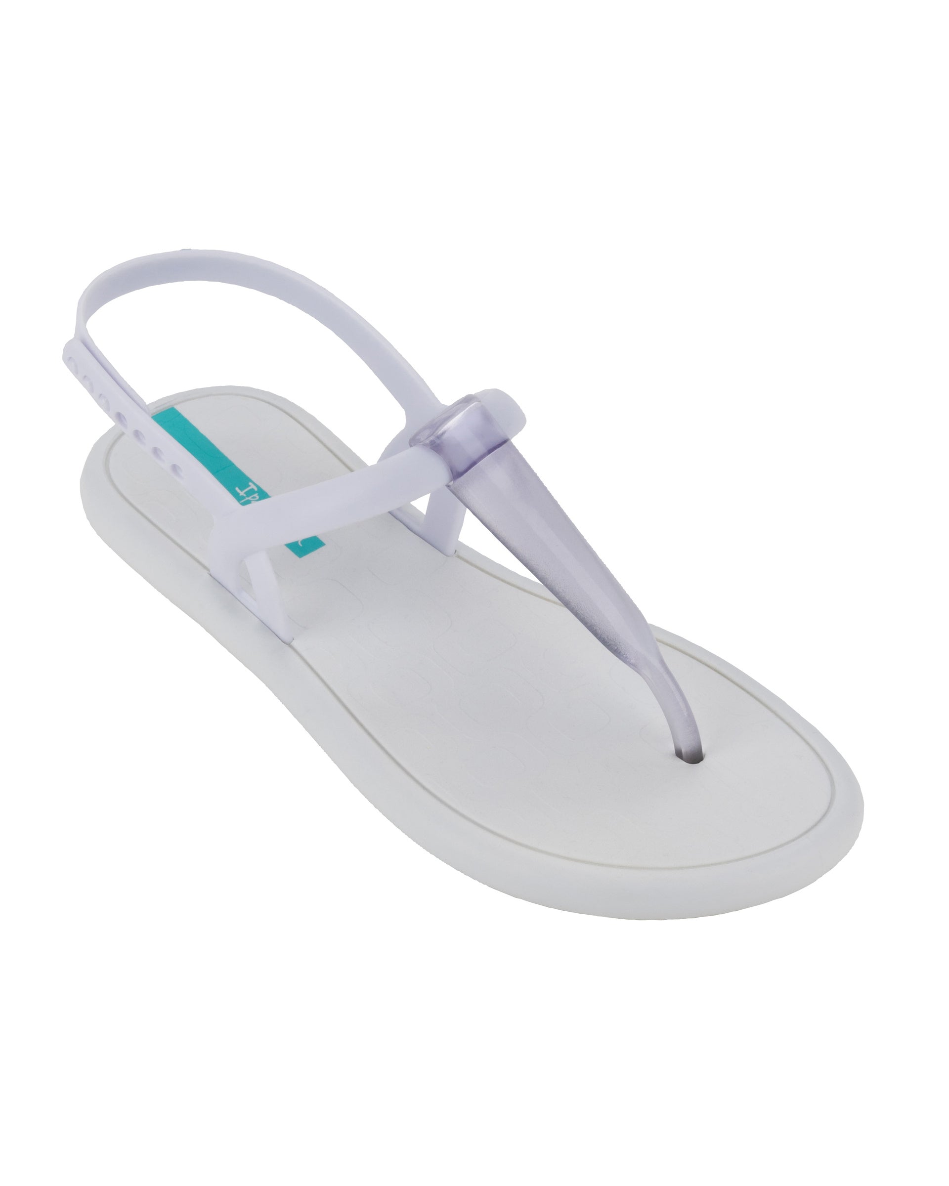 Angled view of a white Ipanema Glossy women's t-strap sandal.