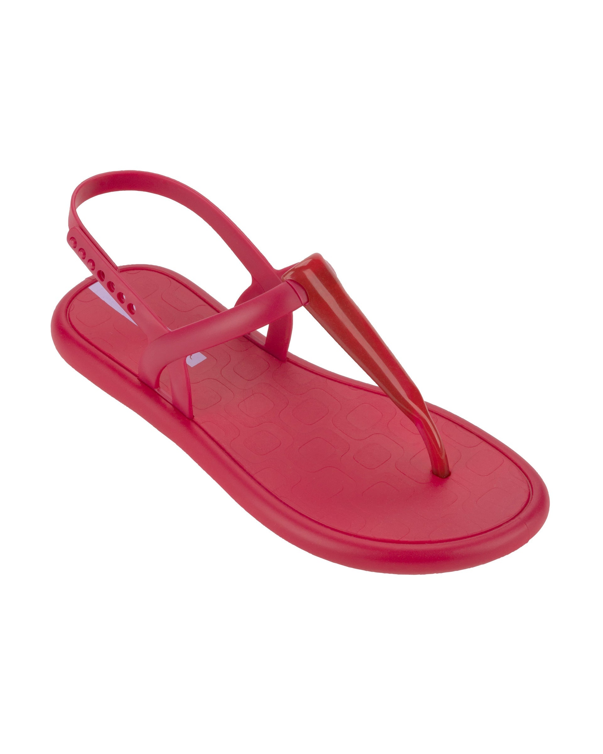 Angled view of a red Ipanema Glossy women's t-strap sandal.
