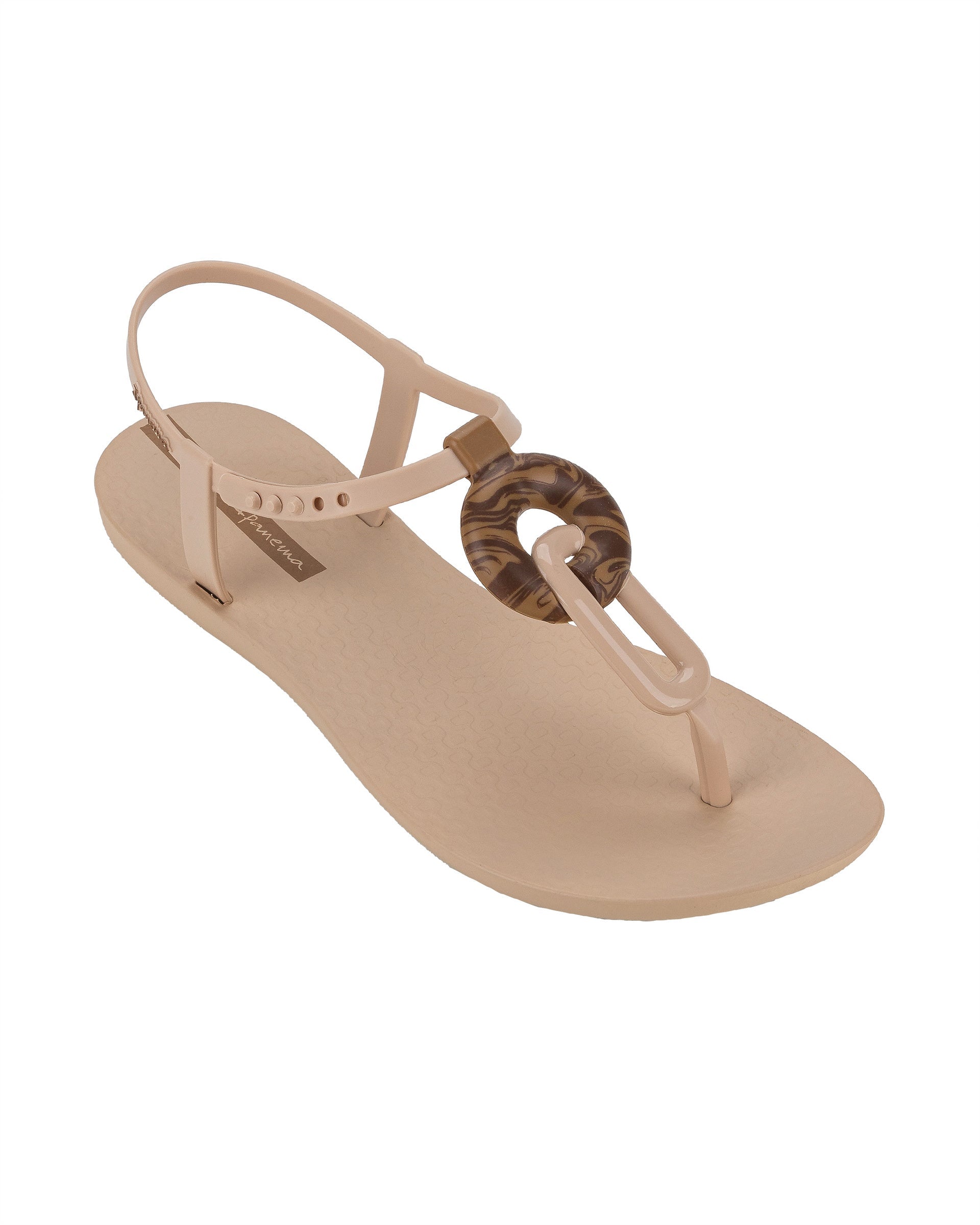 Angled view of a beige Ipanema Class Marble women's t-strap sandal.