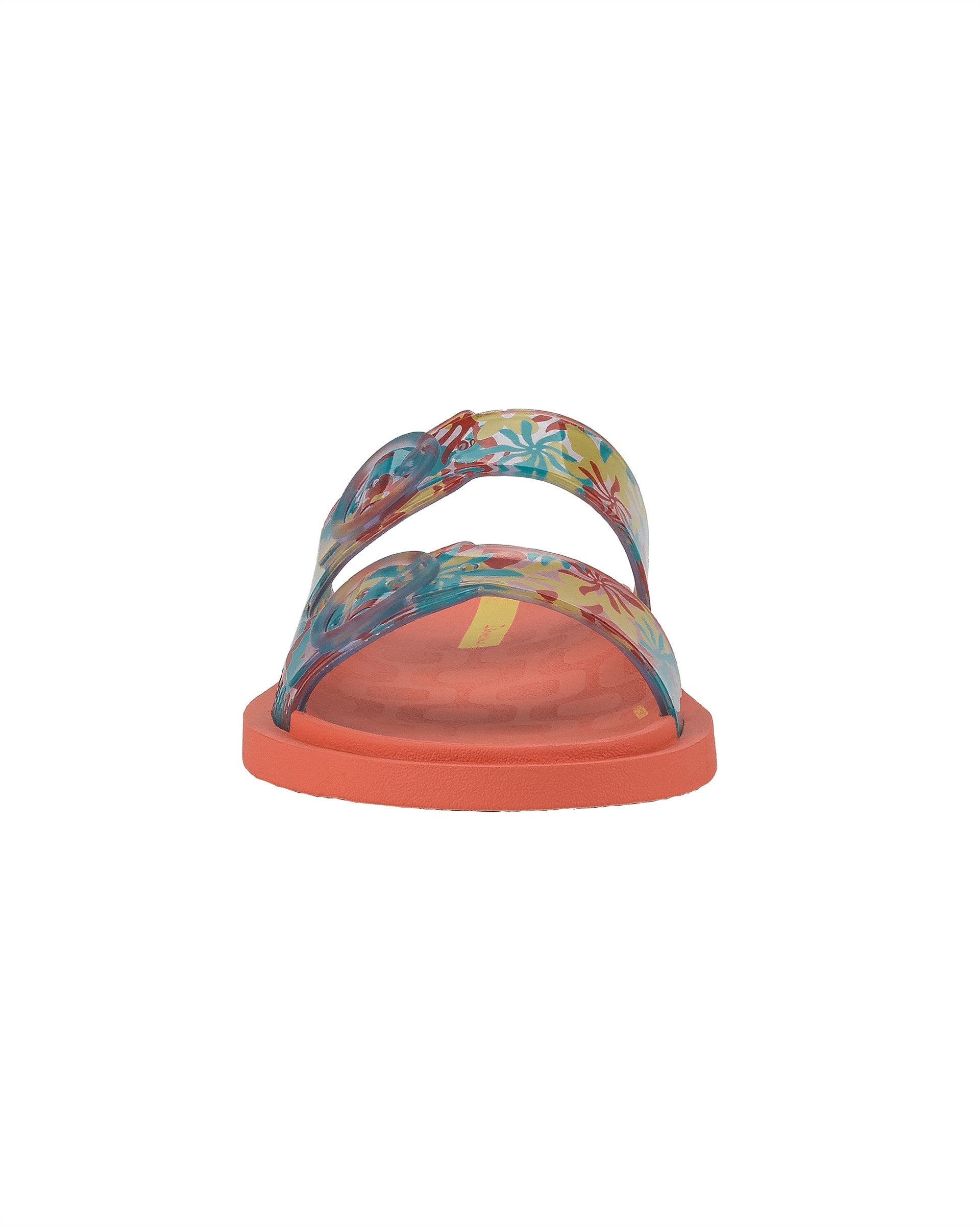 Front view of a orange Ipanema Follow kids slide with floral print on the upper.