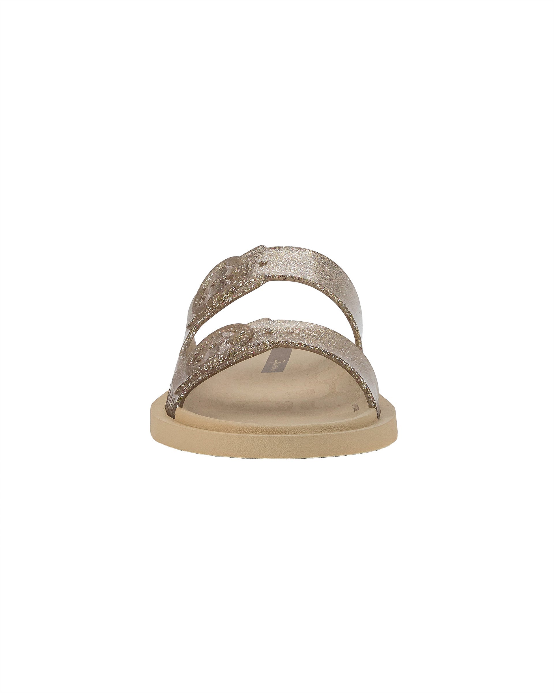 Front view of a beige Ipanema Follow kids slide with a glitter upper.