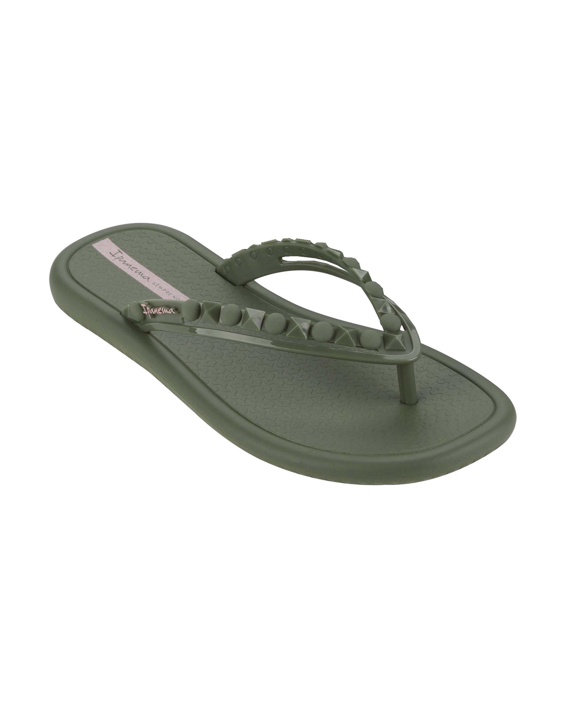 Angled view of a green Ipanema Meu Sol women's flip flop with stud details on strap.