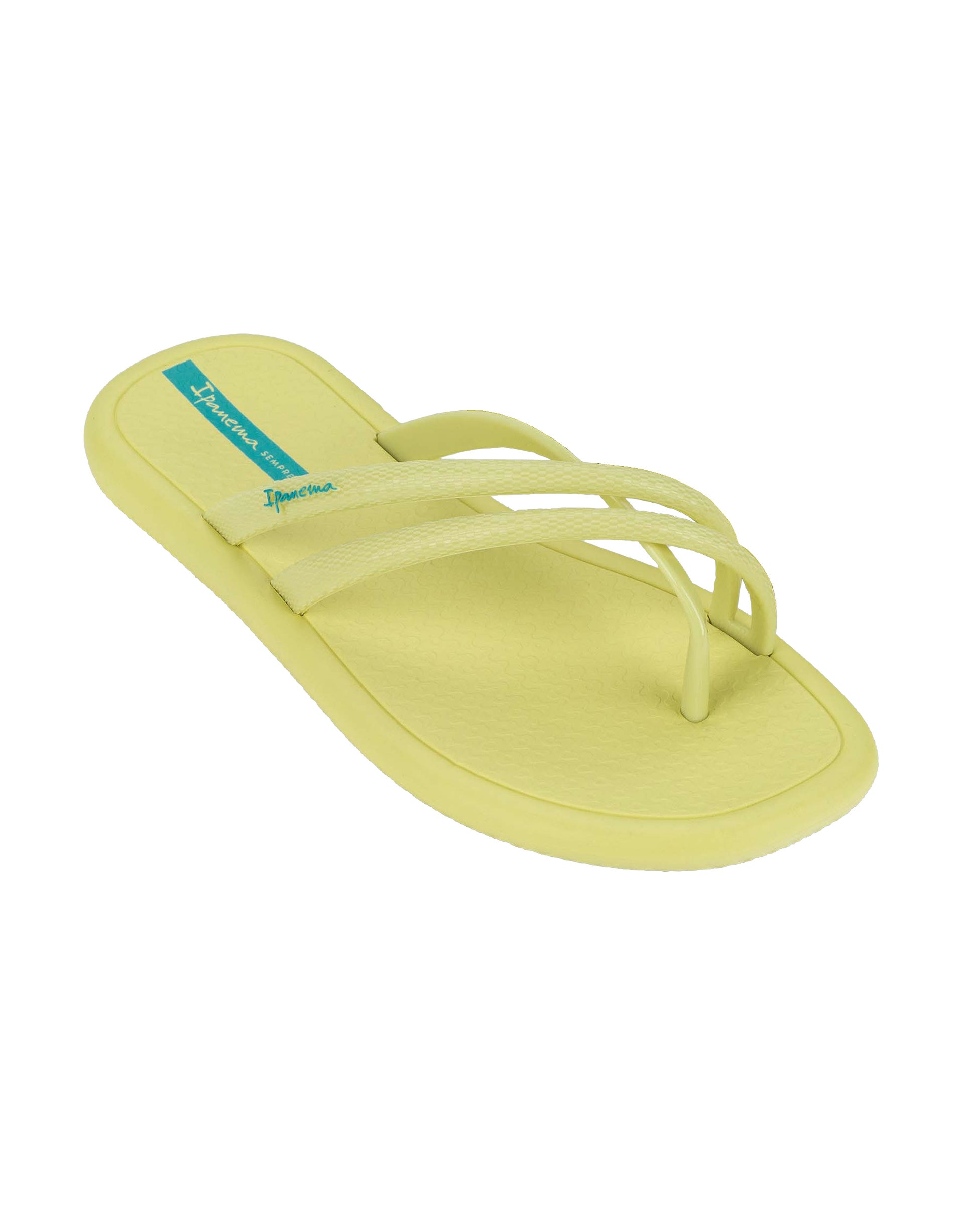 Angled view of a yellow Ipanema Meu Sol Rasteira women's flip flop with cross straps.