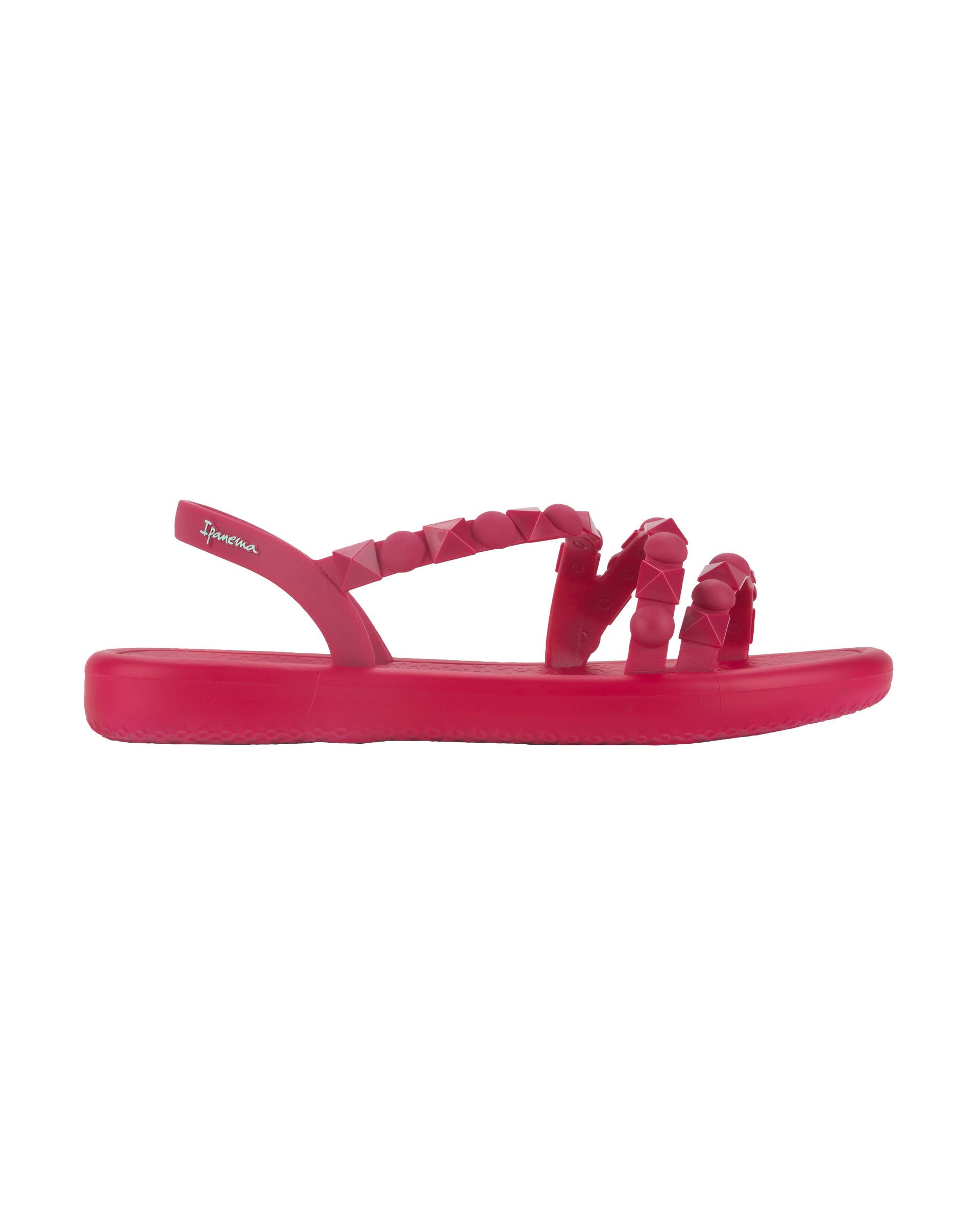 Side view of a dark pink woman's Ipanema Meu Sol flatform sandal.