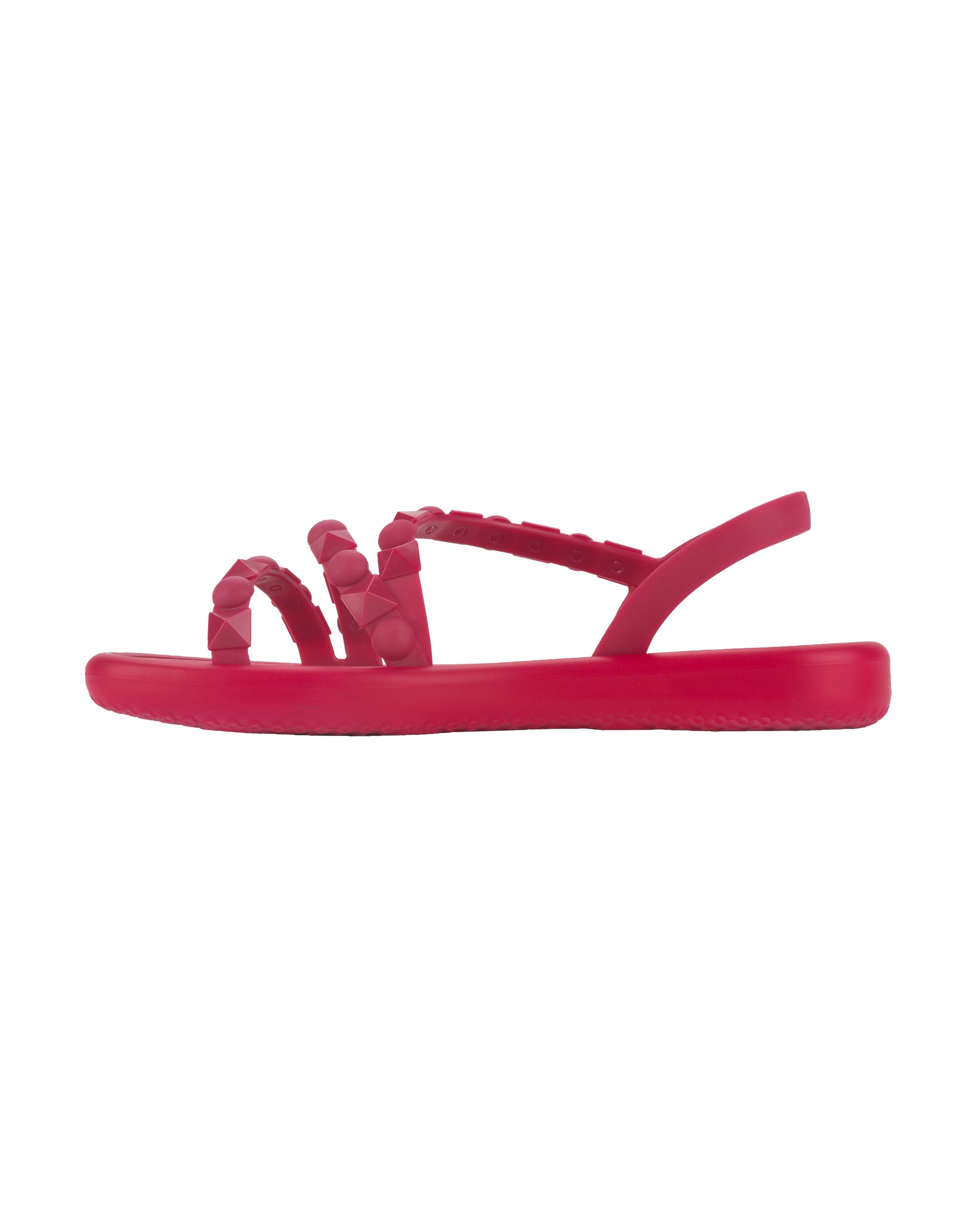 Side view of a dark pink woman's Ipanema Meu Sol flatform sandal.