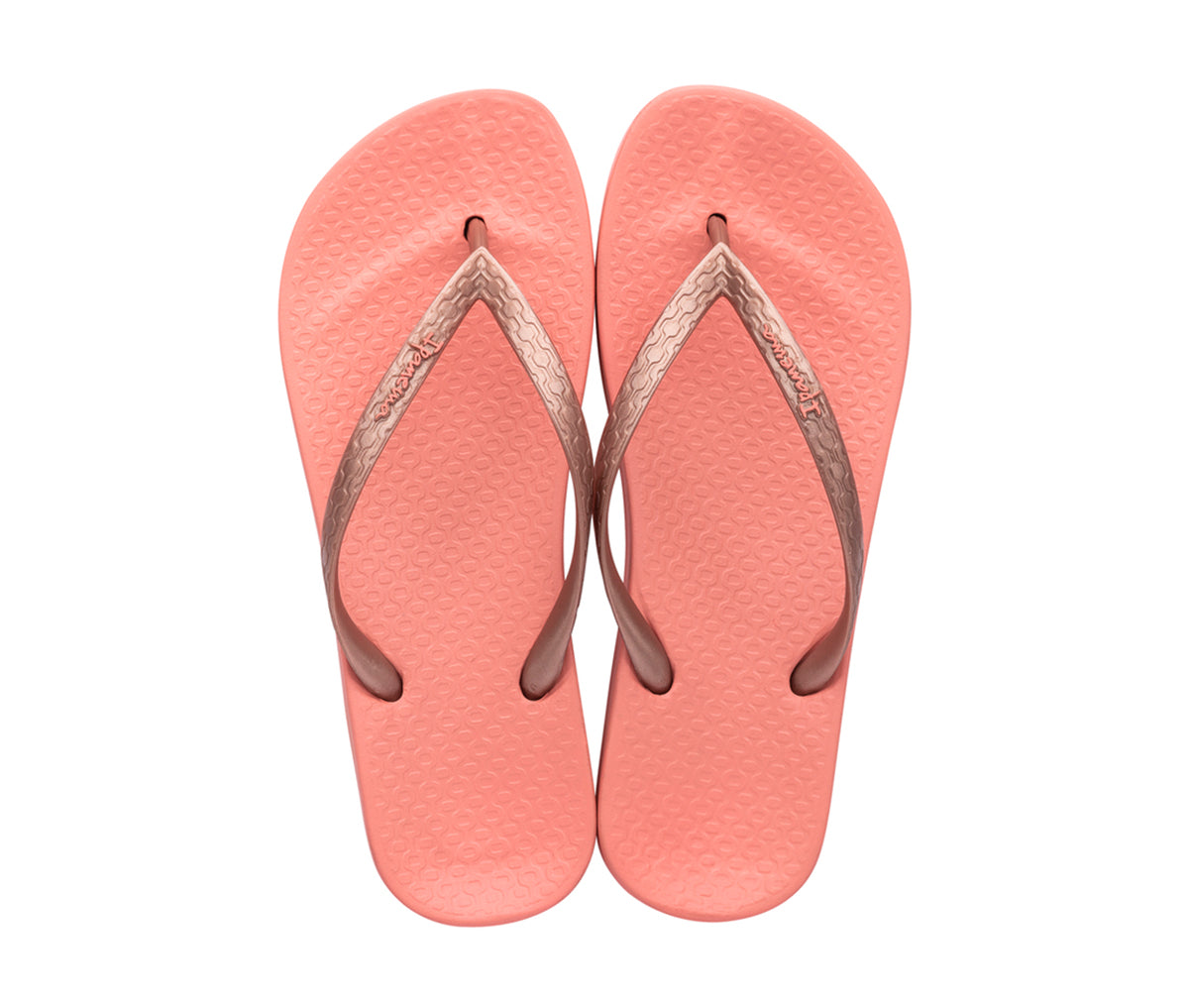 Top view of a pair of orange Ipanema Ana Tan with rose straps flip flops.