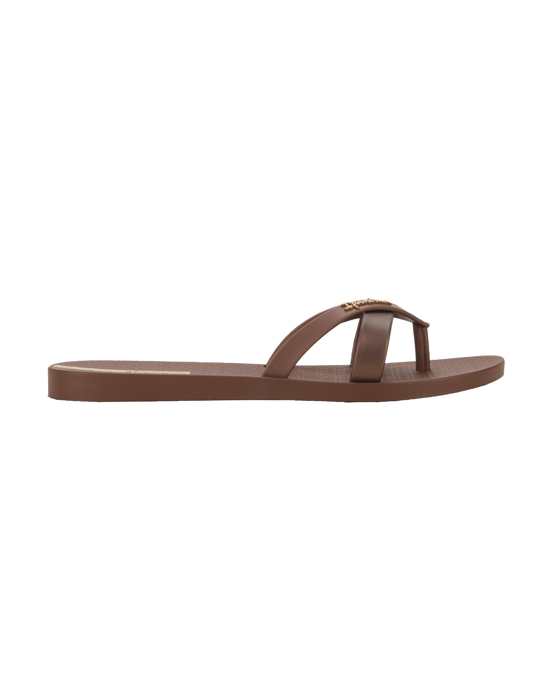 Outer side view of a brown Ipanema Kirei women's flip flop.