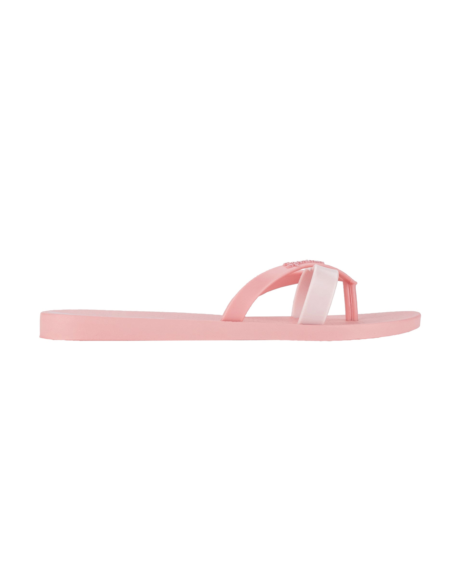 Outer side view of a pink Ipanema Kirei women's flip flop.