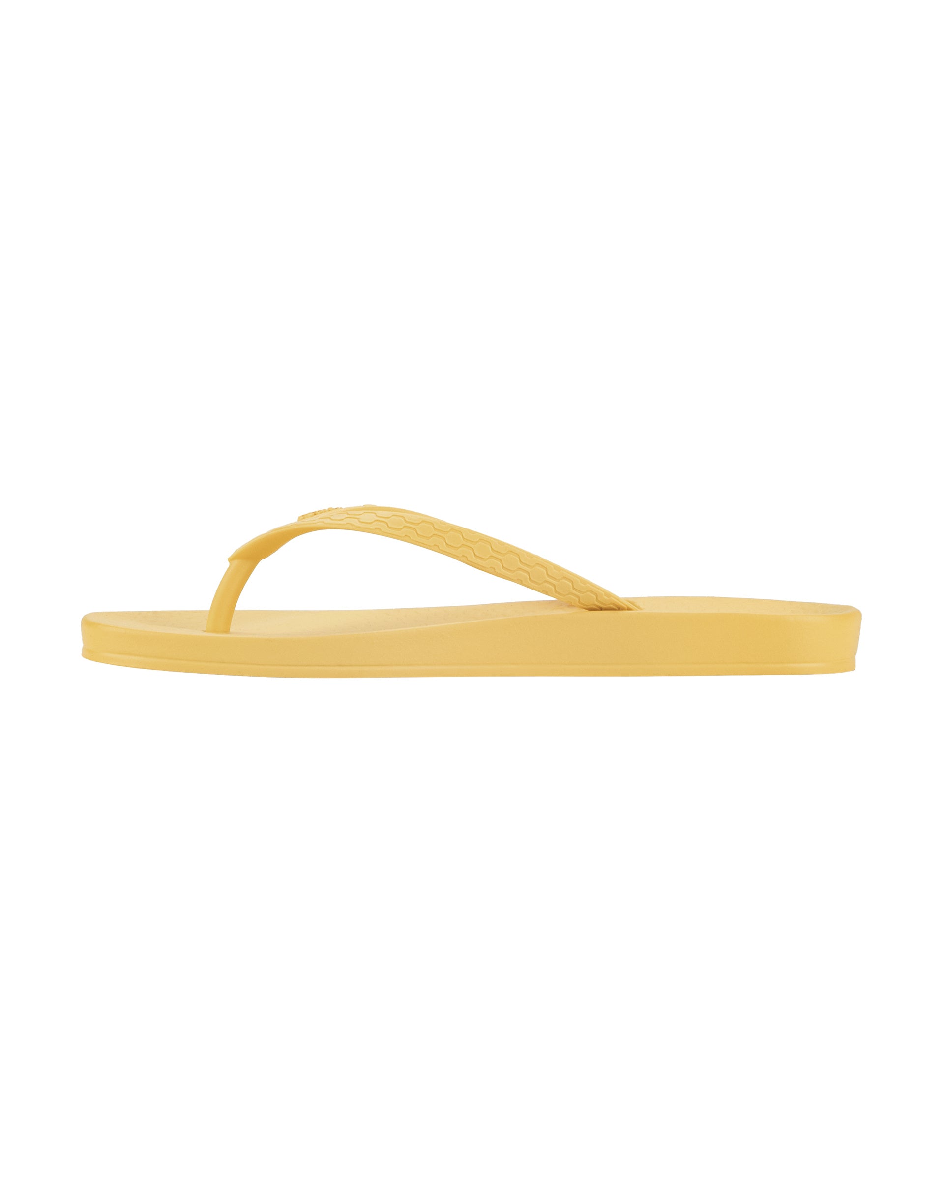 Inner side view of a yellow Ipanema Ana Colors women's flip flop.