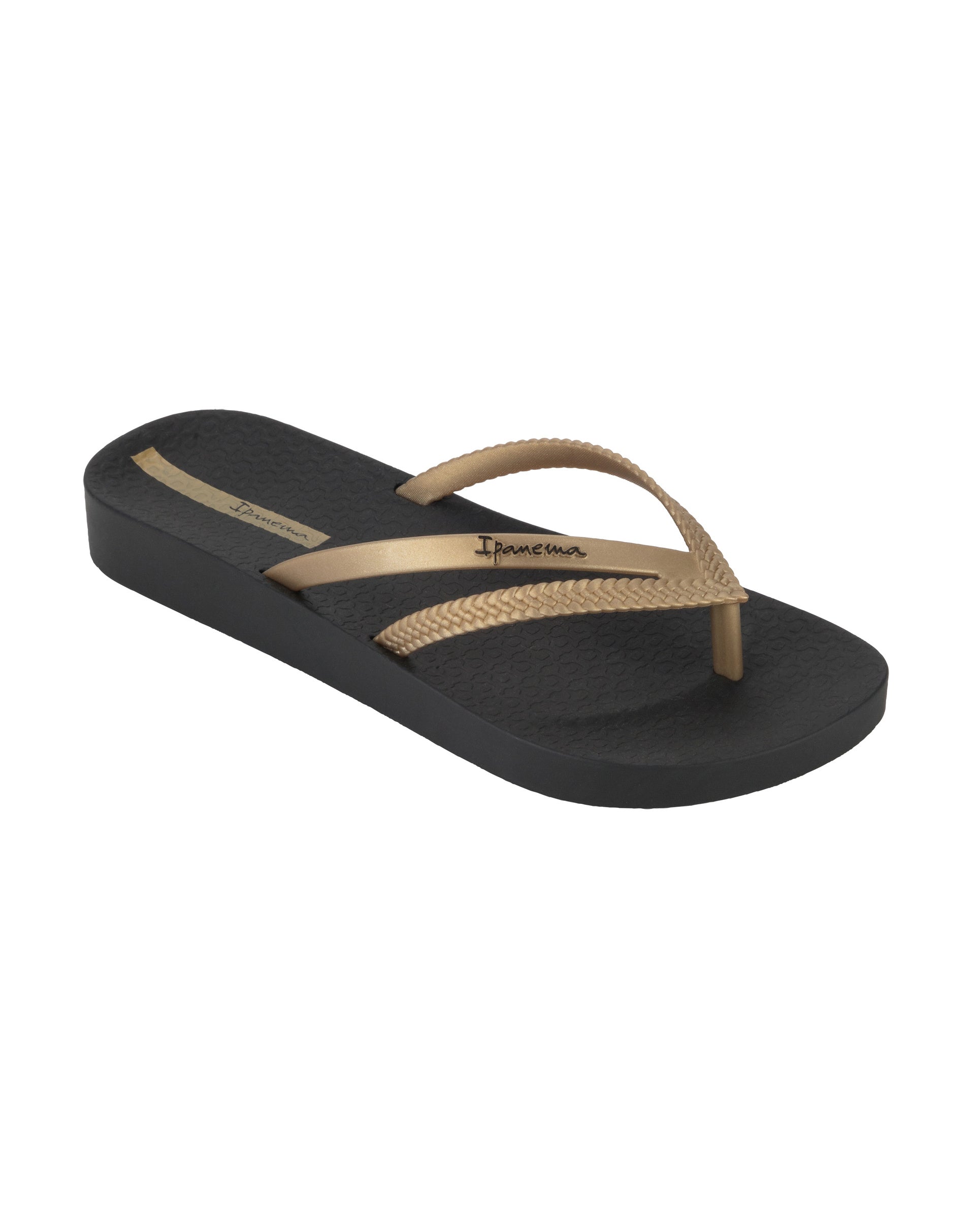 Angled view of a black Ipanema Bossa Soft women's flip flop with metallic gold straps.