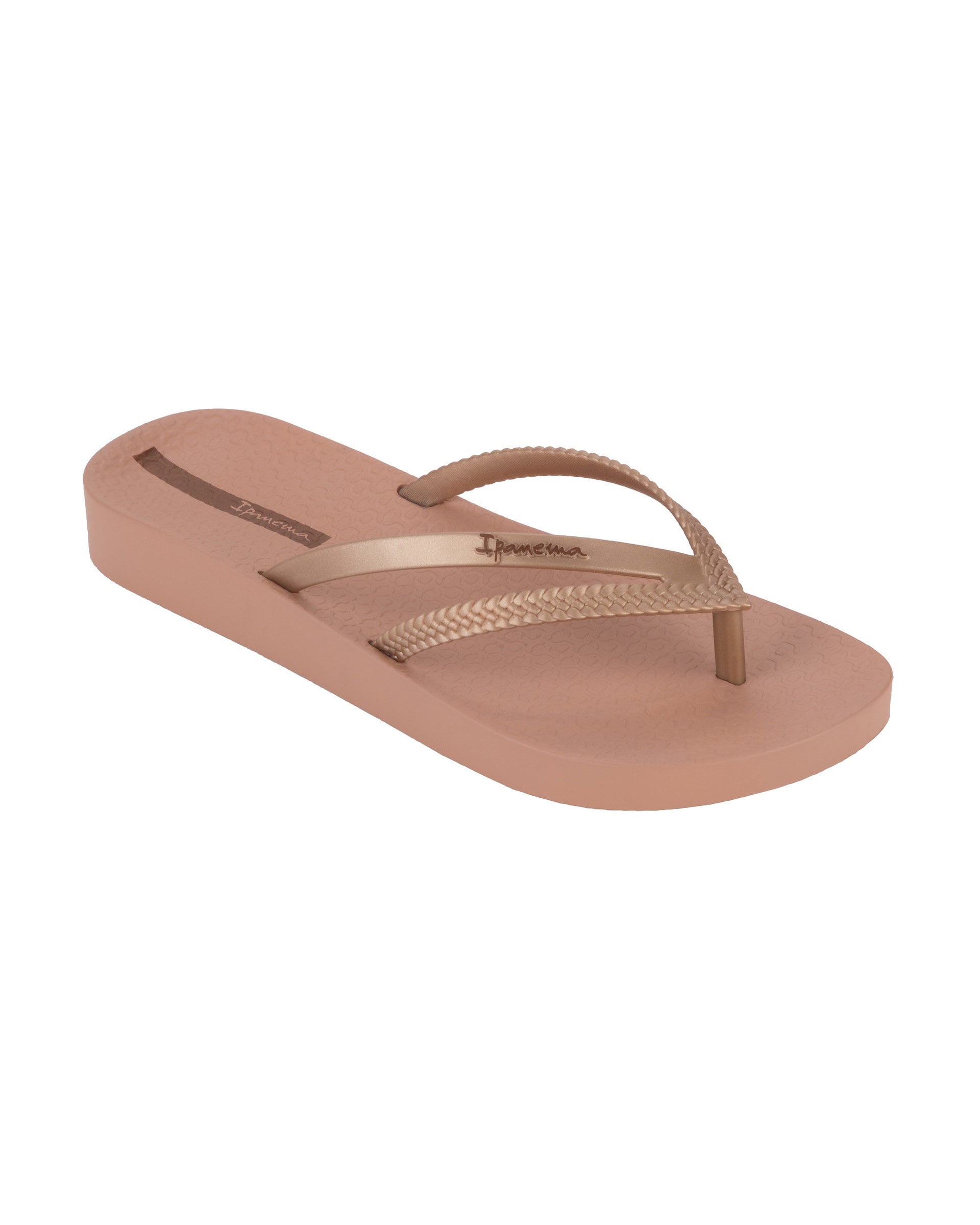 Angled view of a pink Ipanema Bossa Soft women's flip flop with metallic rose gold straps.