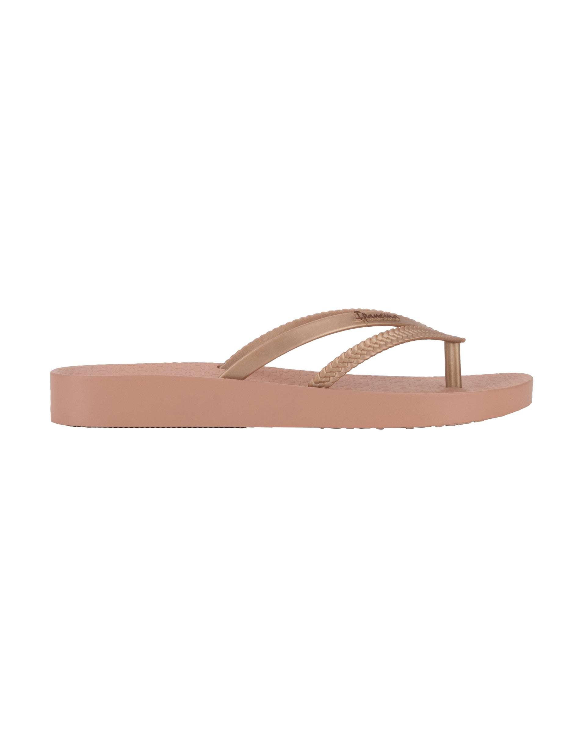 Outer side view of a pink Ipanema Bossa Soft women's flip flop with metallic rose gold straps.
