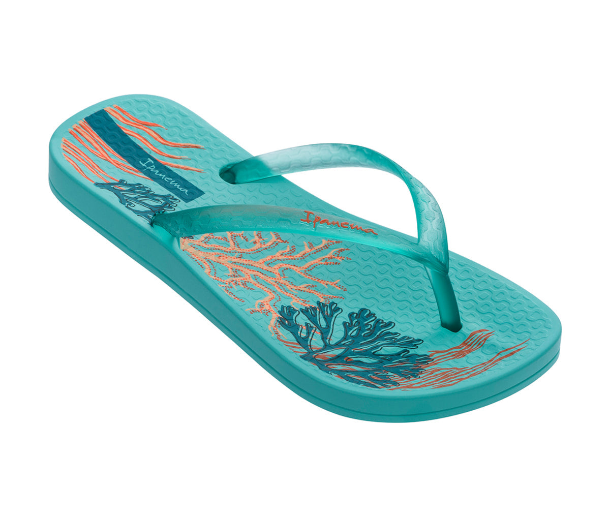 Angled view of a blue Ipanema Ana Glossy kids flip flop  with an under the sea print on the footbed.