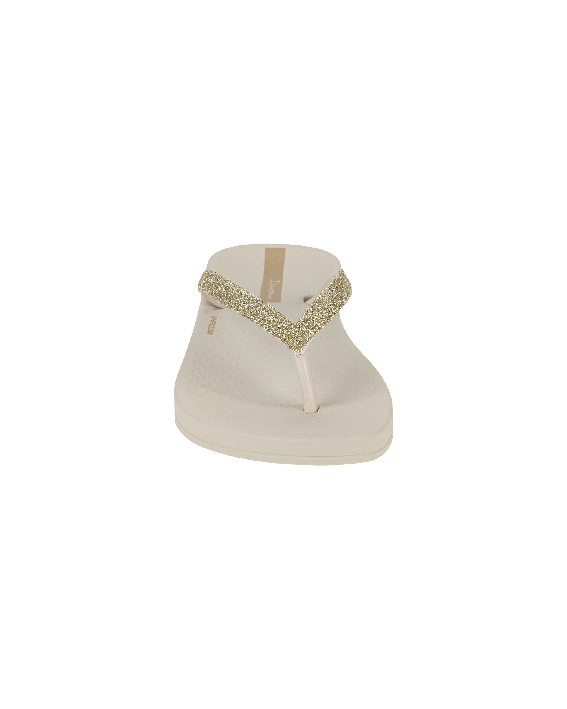Front view of a beige Ipanema Ana Sparkle kids flip flop with gold glitter strap.