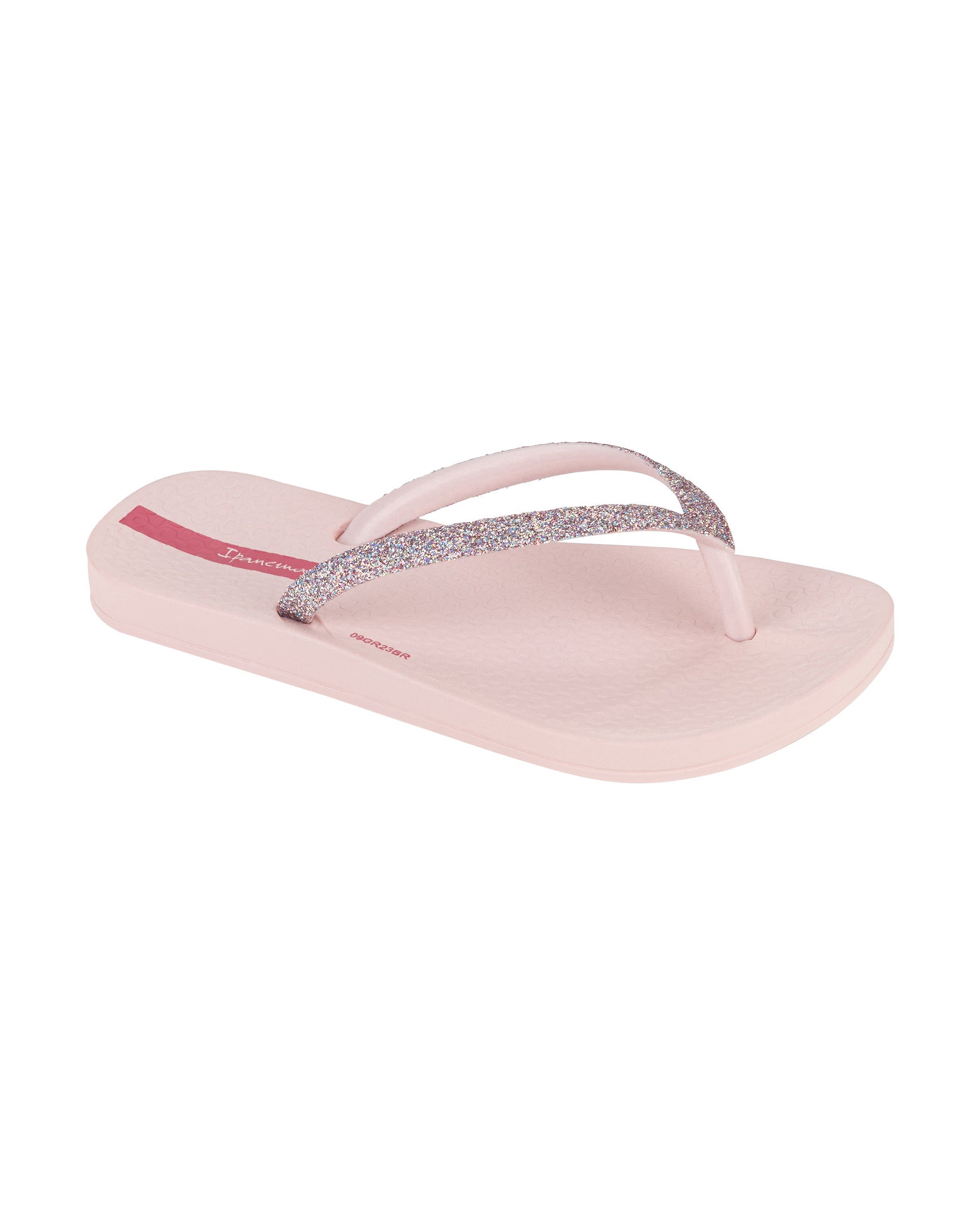 Angled view of a pink Ipanema Ana Sparkle kids flip flop with multicolor glitter strap.