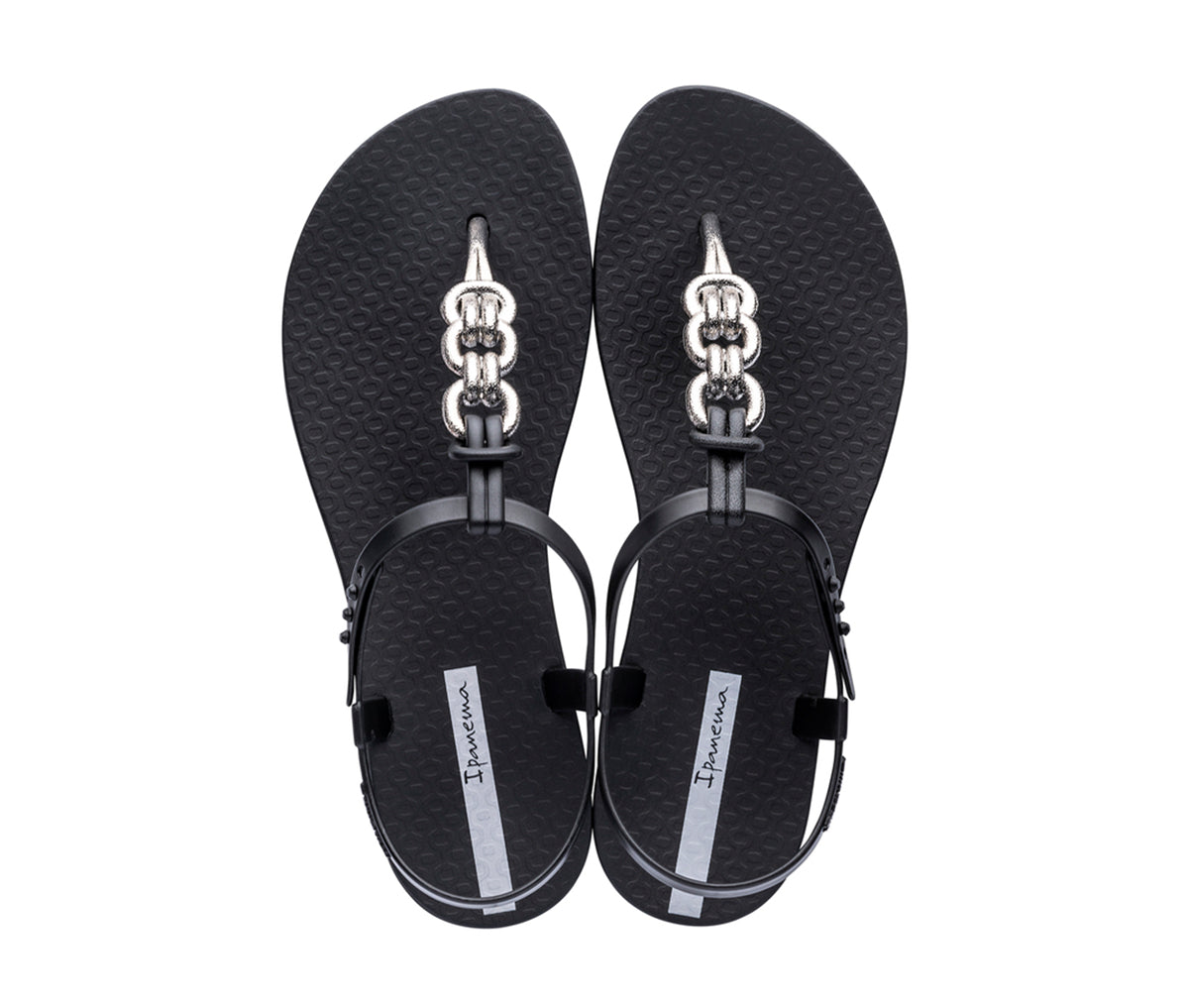 Top view of a pair of black Ipanema Connect sandals with a silver chain-inspired T-strap.