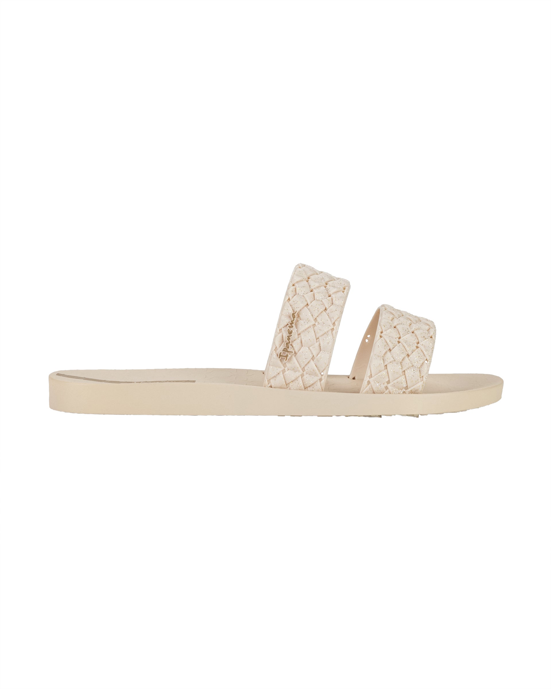 Outer side view of a beige Ipanema Renda women's slide with braided beige glitter straps.