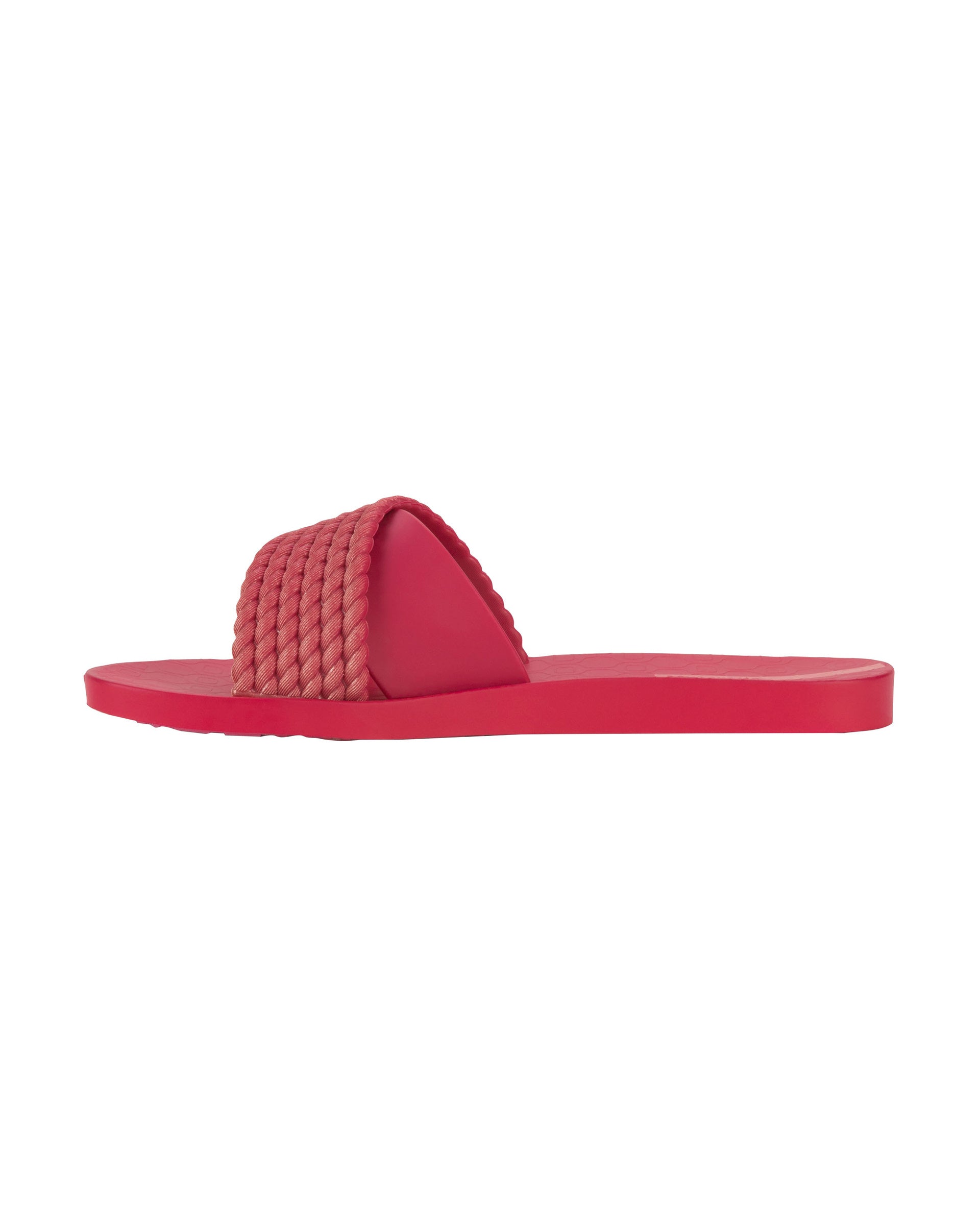 Inner side view of a red Ipanema Street women's slide.