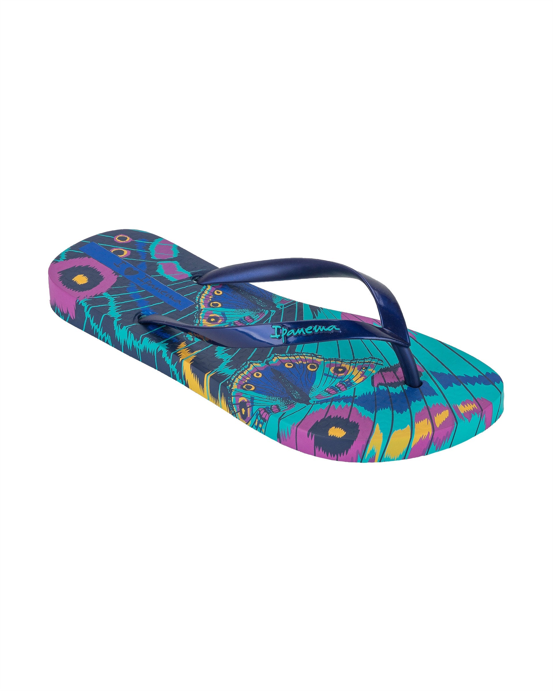 Angled view of a blue Ipanema Animal Print women's flip flop with glitter blue straps and butterfly sole print.