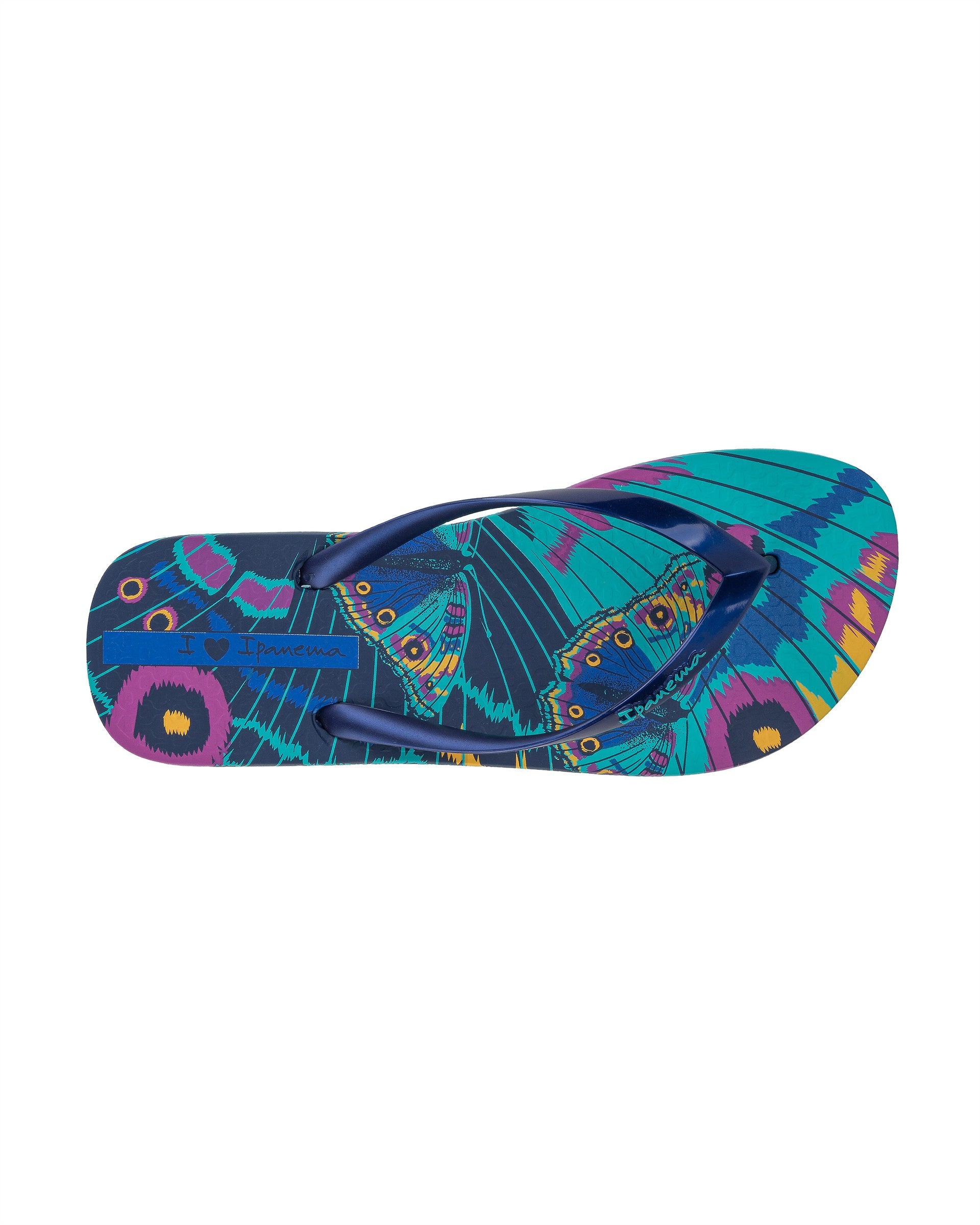 Top view of a blue Ipanema Animal Print women's flip flop with glitter blue straps and butterfly sole print.