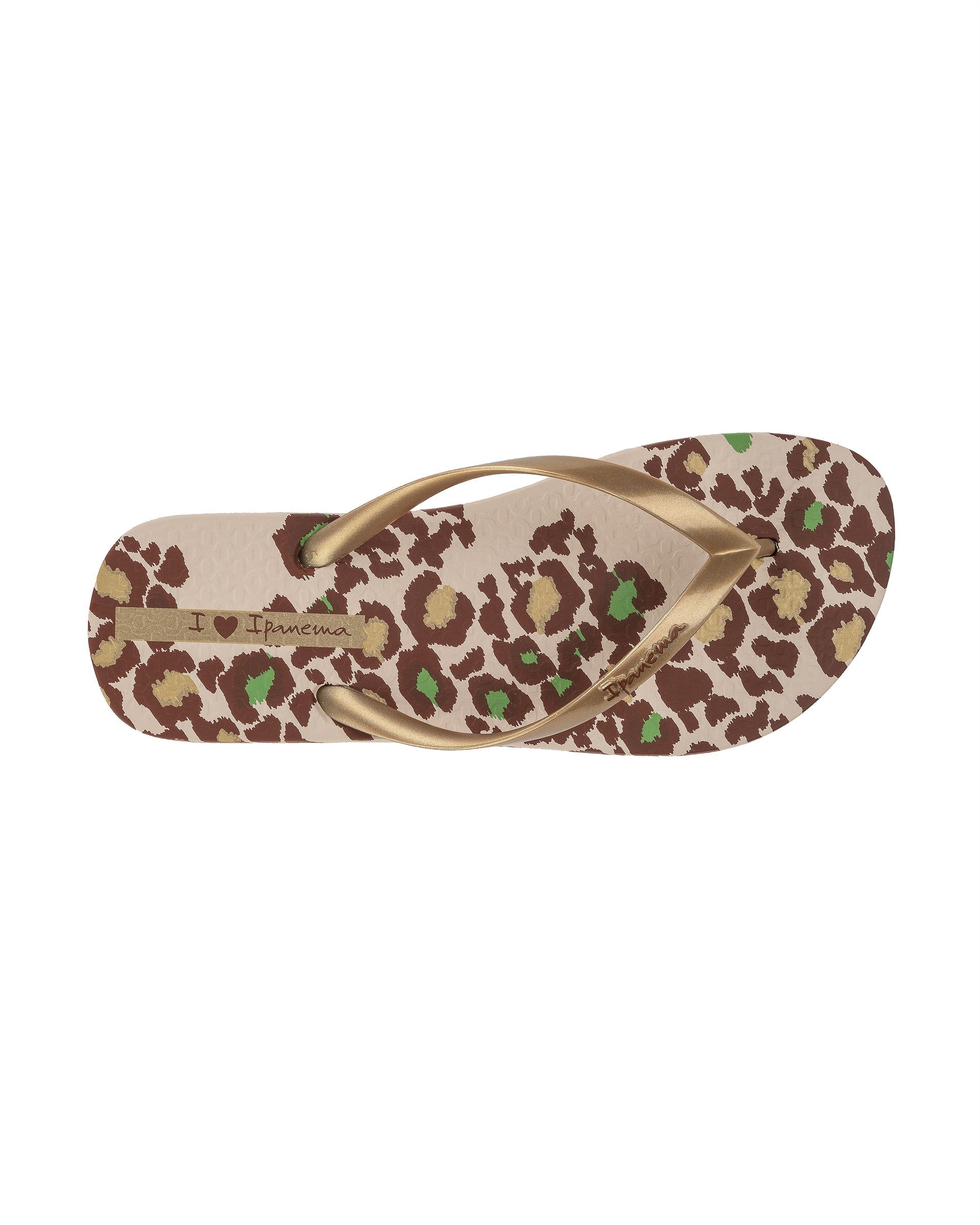 Top view of a beige Ipanema Animal Print women's flip flop with glitter gold straps and leopard sole print.