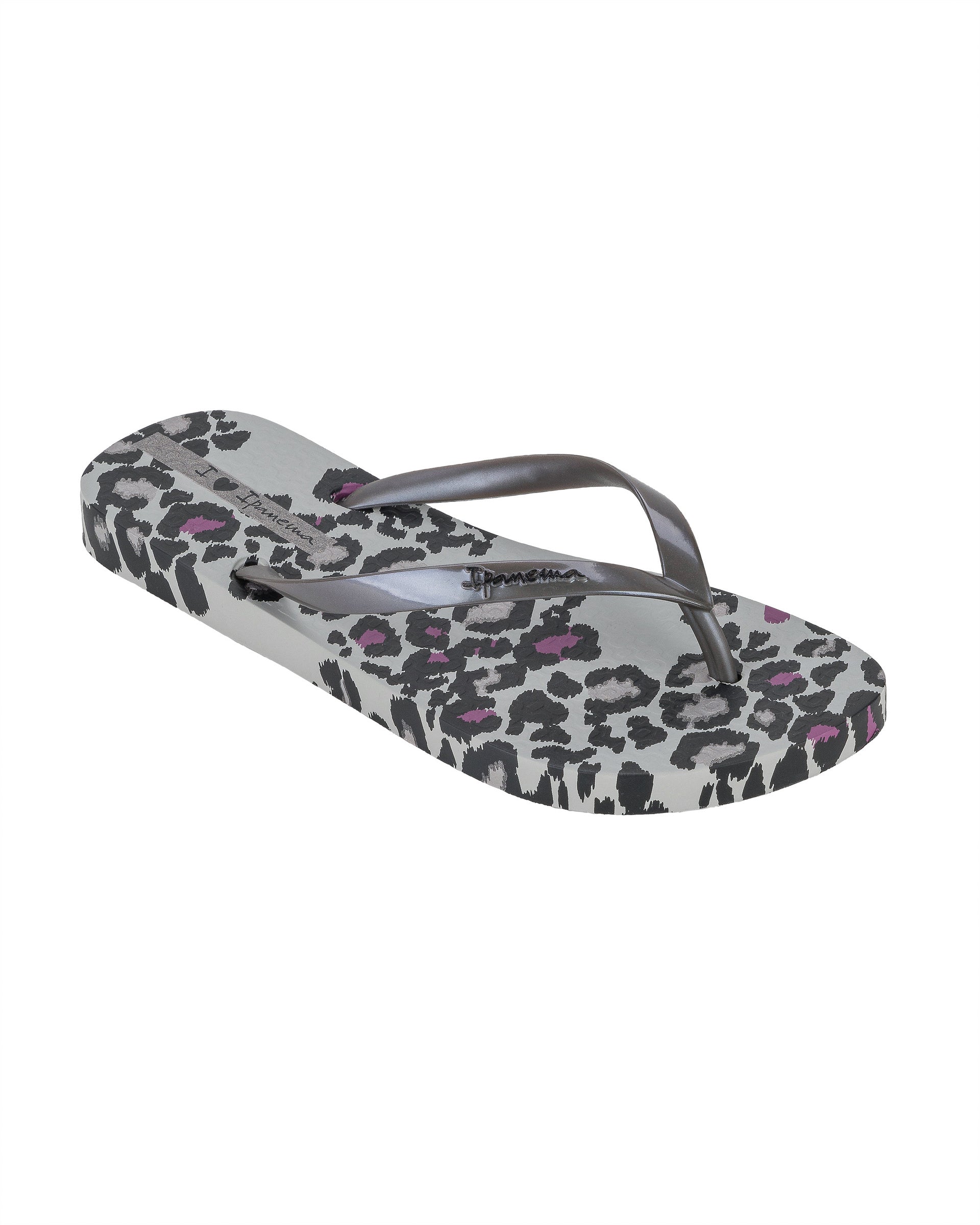 Angled view of a grey Ipanema Animal Print women's flip flop with glitter grey straps and leopard sole print.