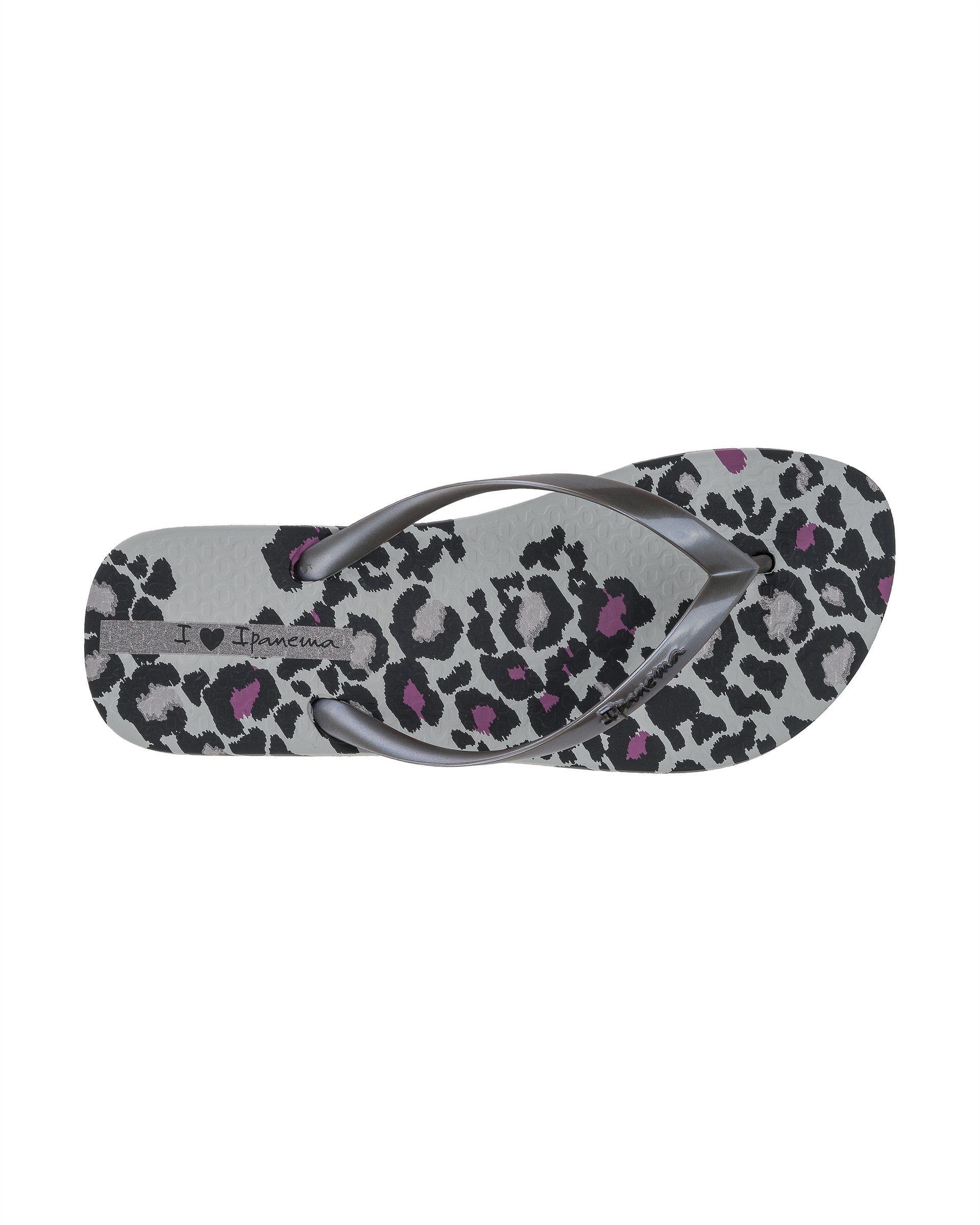Top view of a grey Ipanema Animal Print women's flip flop with glitter grey straps and leopard sole print.