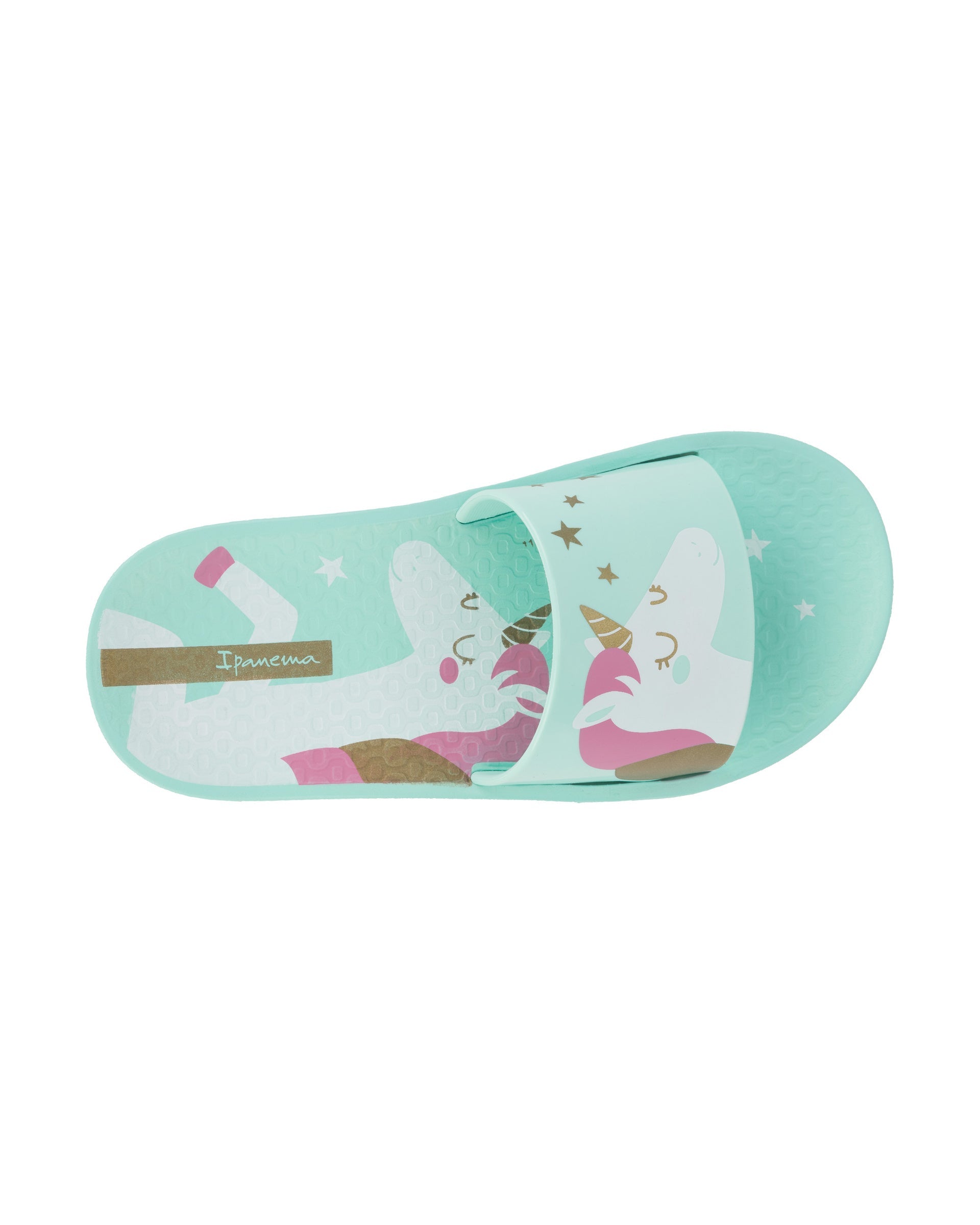 Top view of a green Ipanema Urban kids slide with a unicorn on the upper.