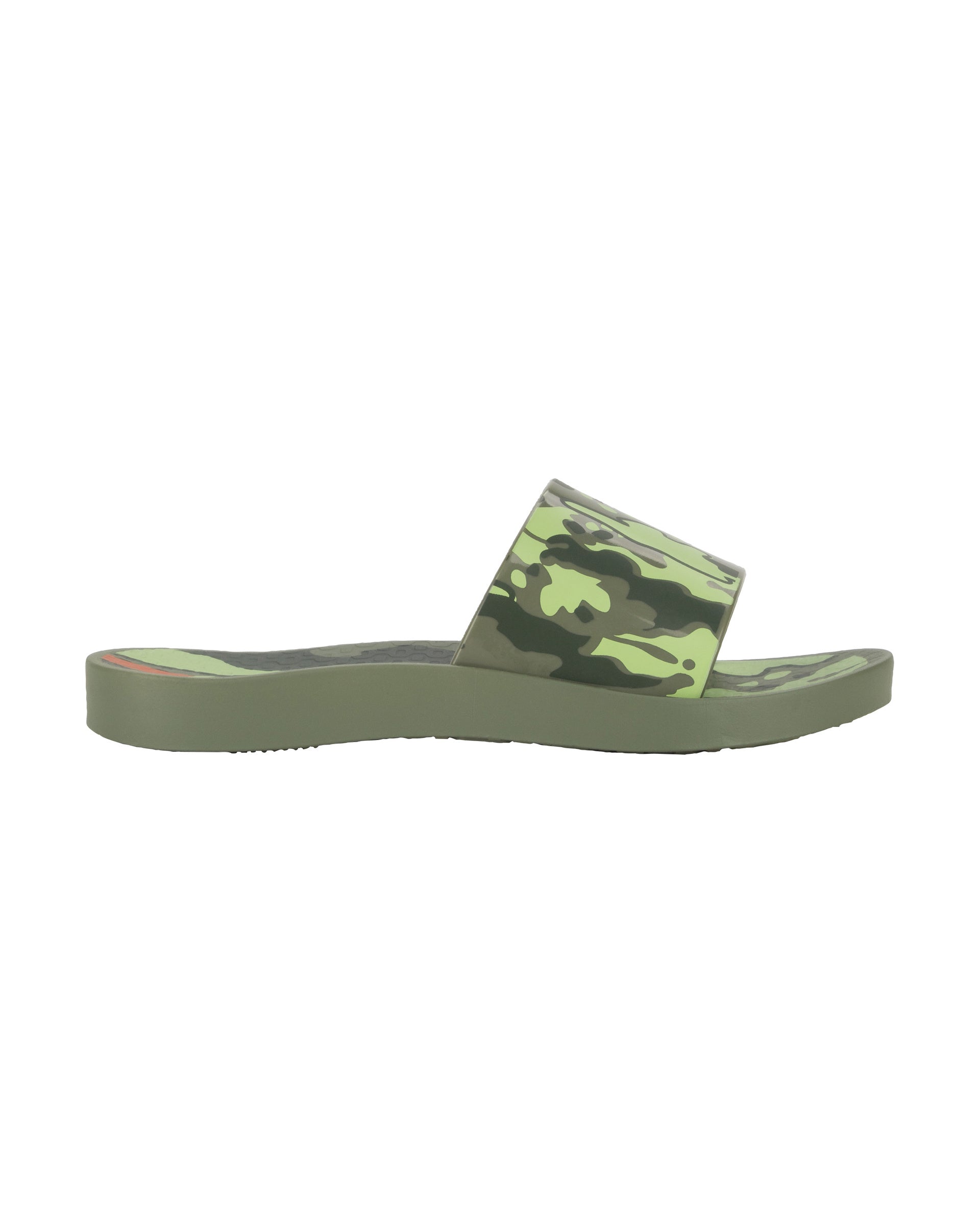 Outer side view of a green Ipanema Urban kids slide with a camo print on the upper.