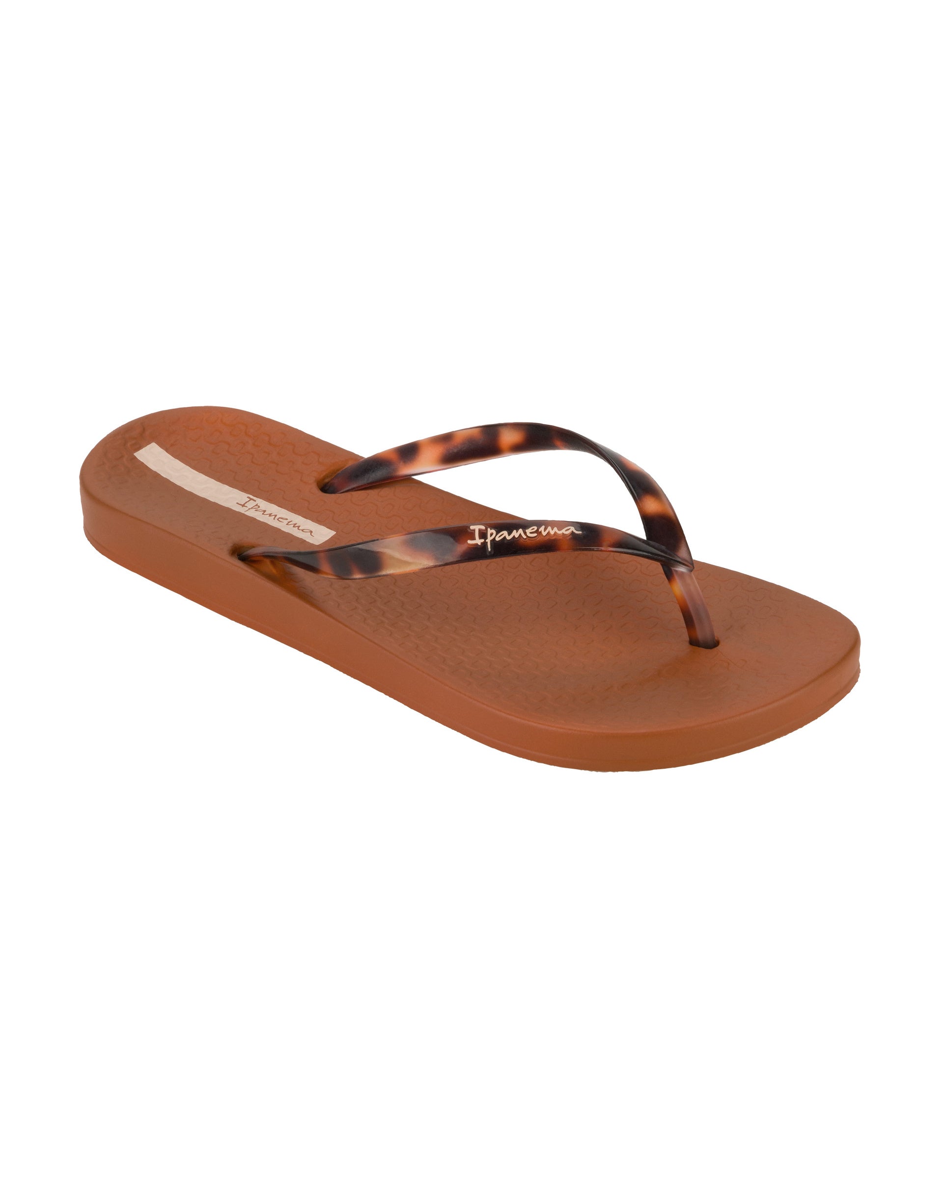 Angled view of a brown Ipanema Ana Connect women's flip flop with brown tortoiseshell  color strap.