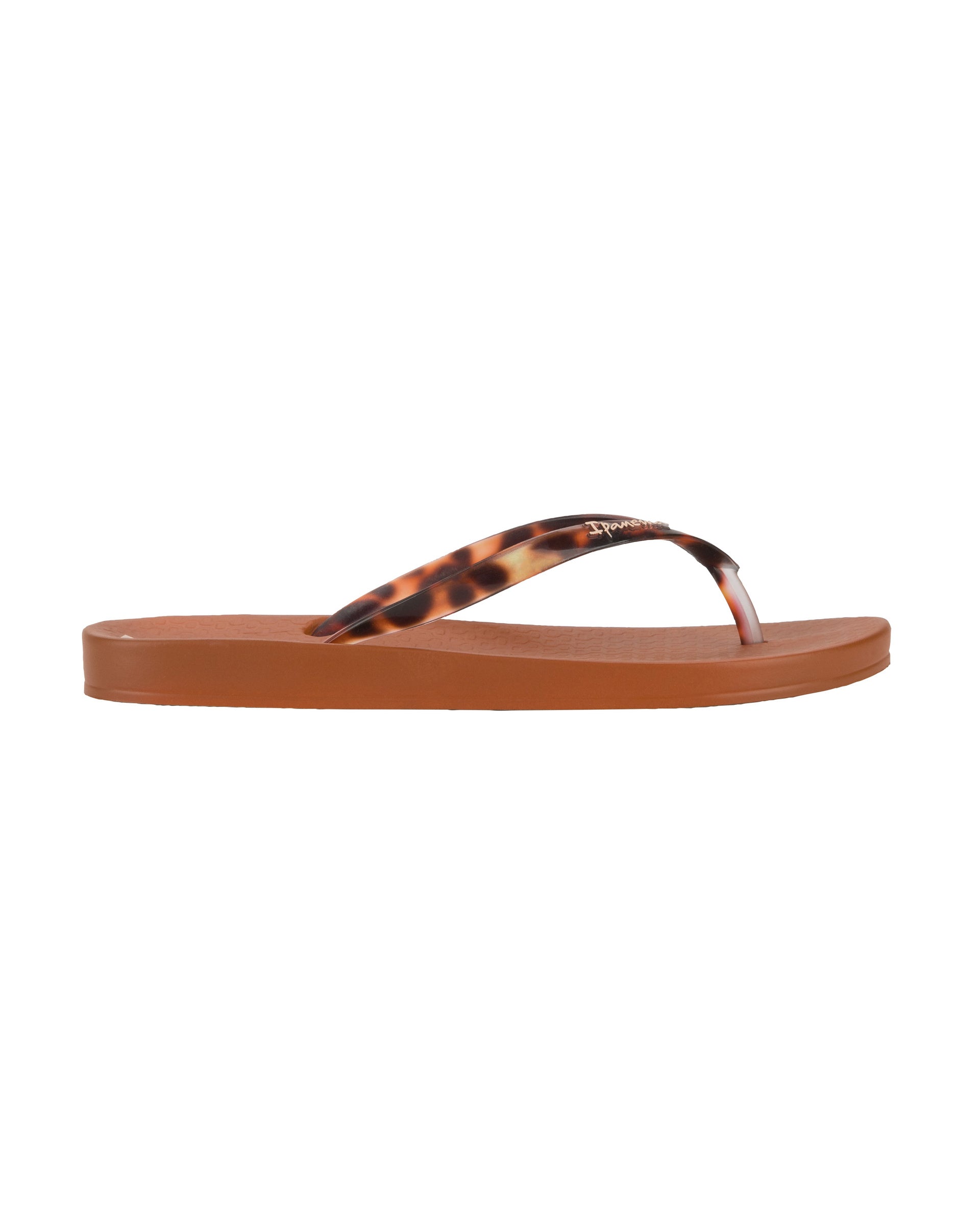 Outer side view of a brown Ipanema Ana Connect women's flip flop with brown tortoiseshell  color strap.