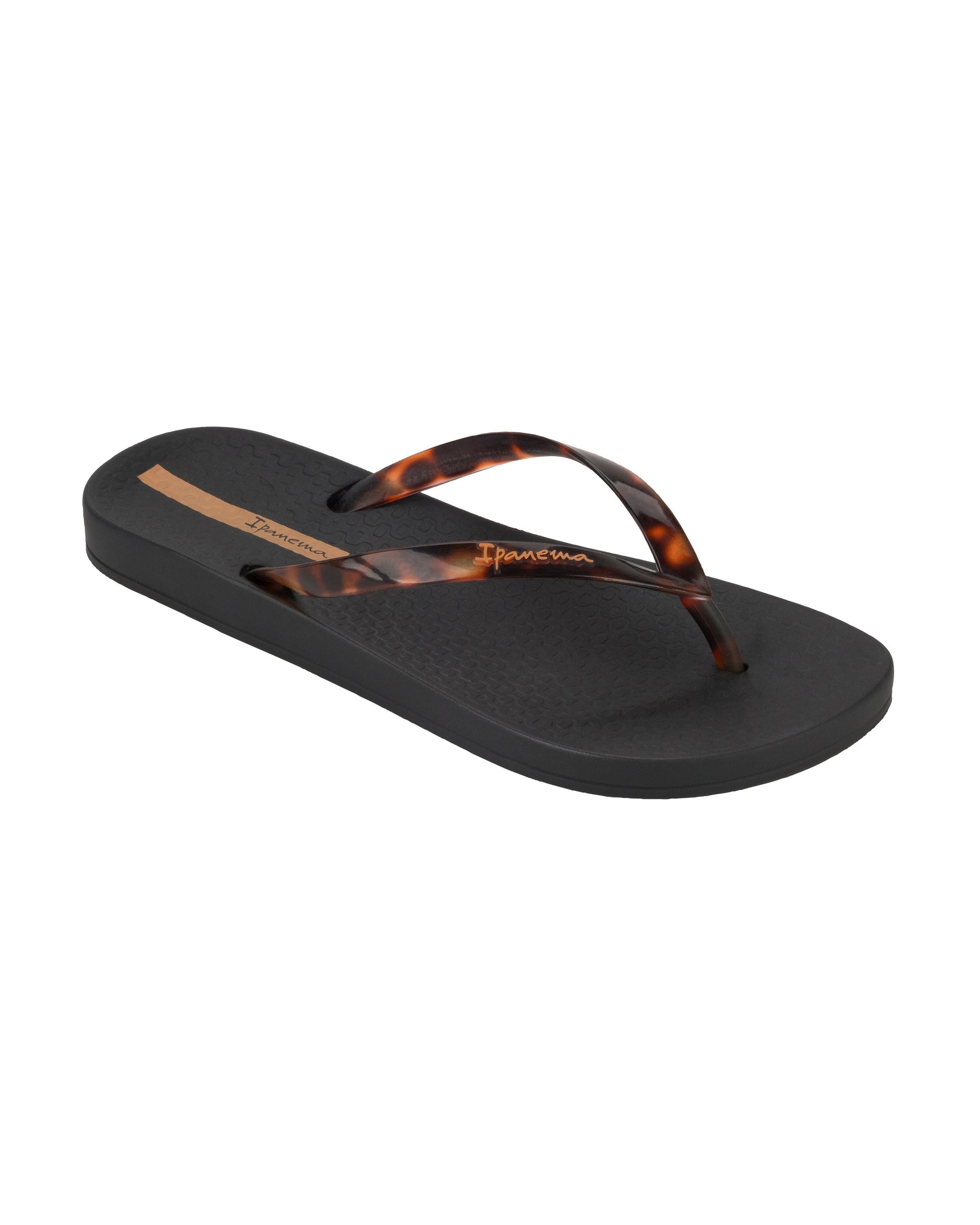 Angled view of a black Ipanema Ana Connect women's flip flop with brown tortoiseshell  color strap.