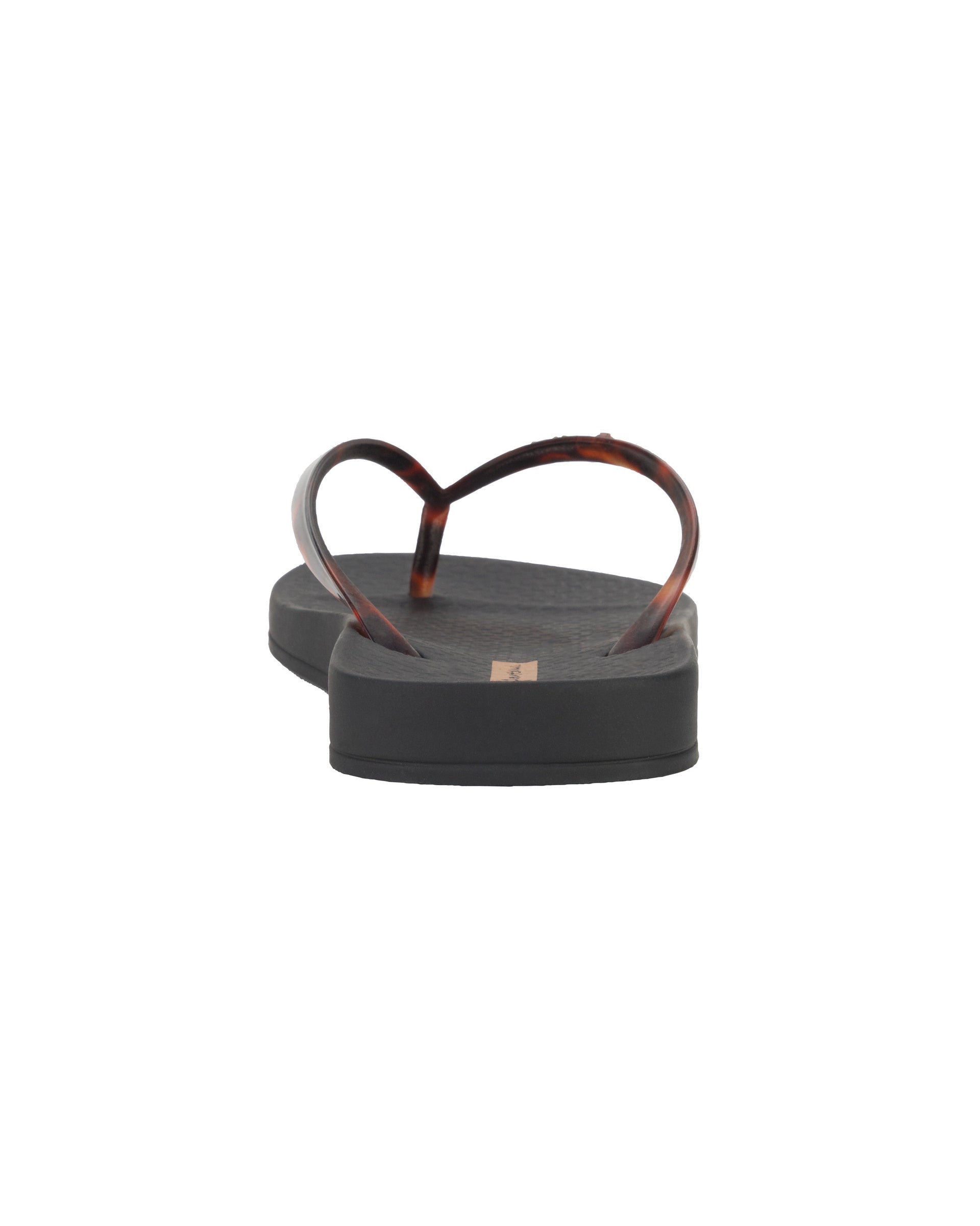 Back view of a black Ipanema Ana Connect women's flip flop with brown tortoiseshell  color strap.
