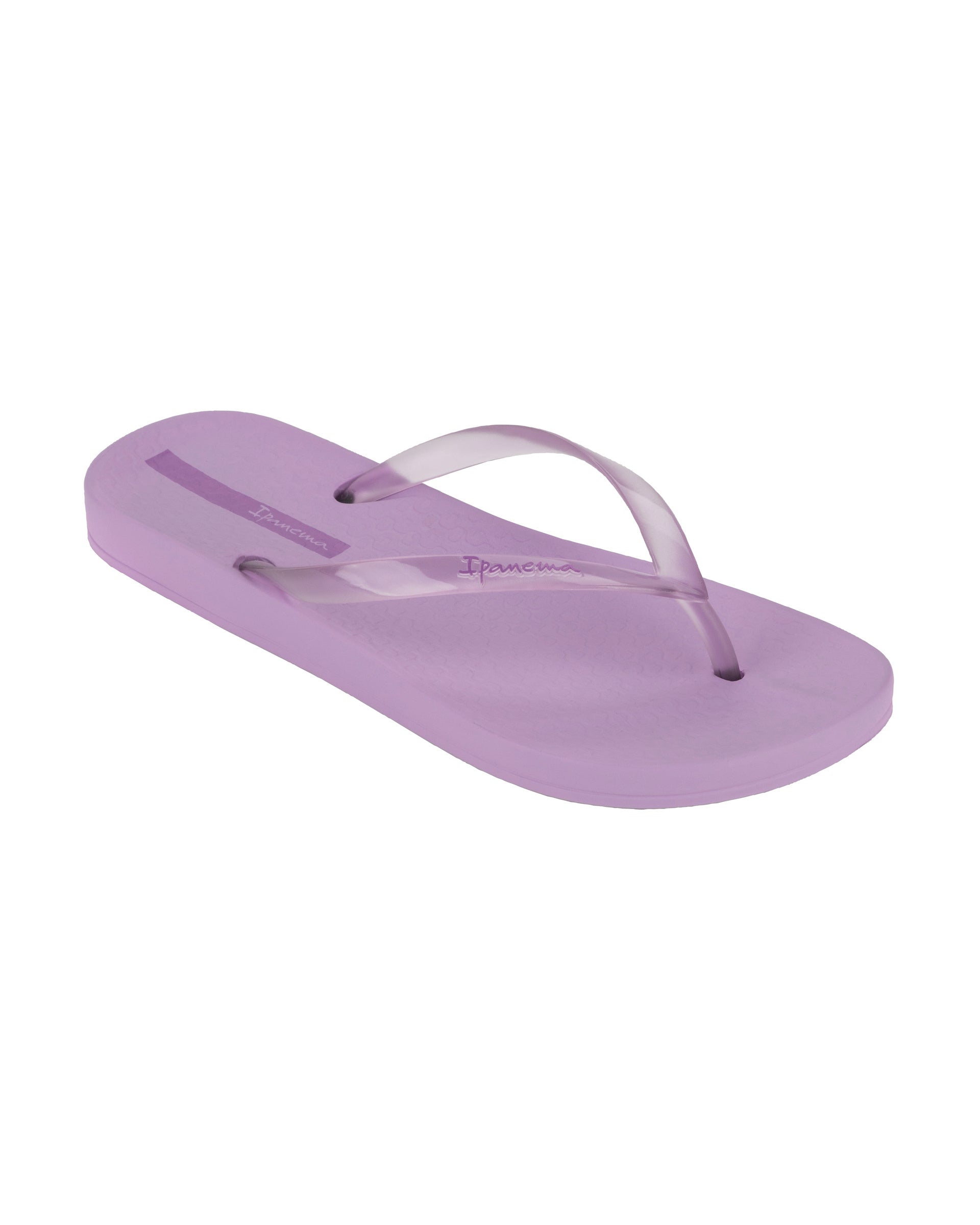 Angled view of a purple Ipanema Ana Connect women's flip flop with a clear purple strap.