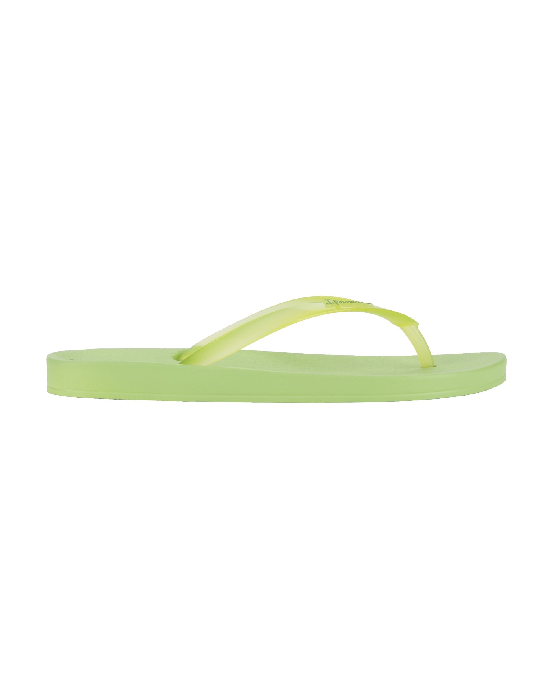 Outer side view of a green Ipanema Ana Connect women's flip flop with a clear green strap.