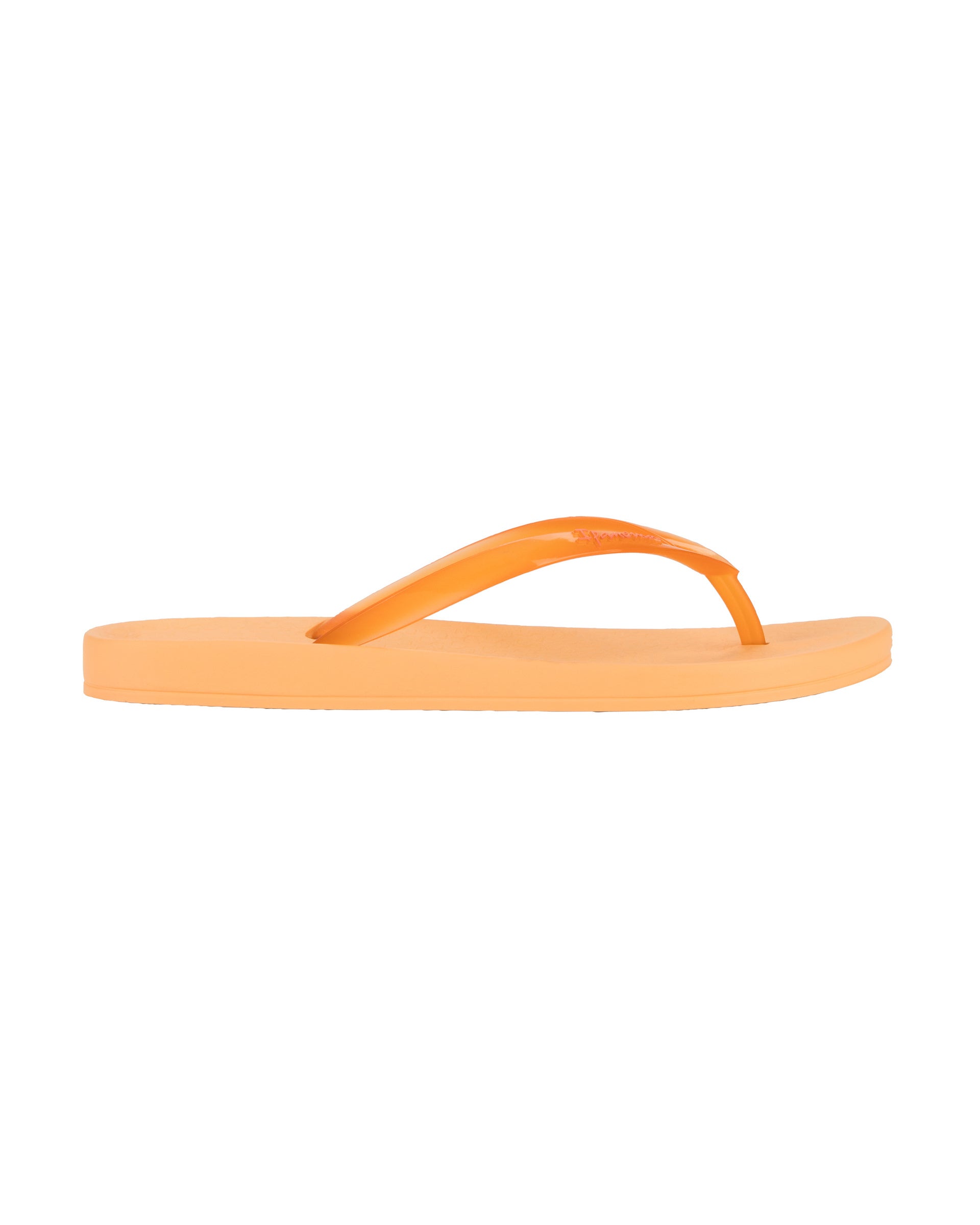 Outer side view of a orange Ipanema Ana Connect women's flip flop with a clear orange strap.