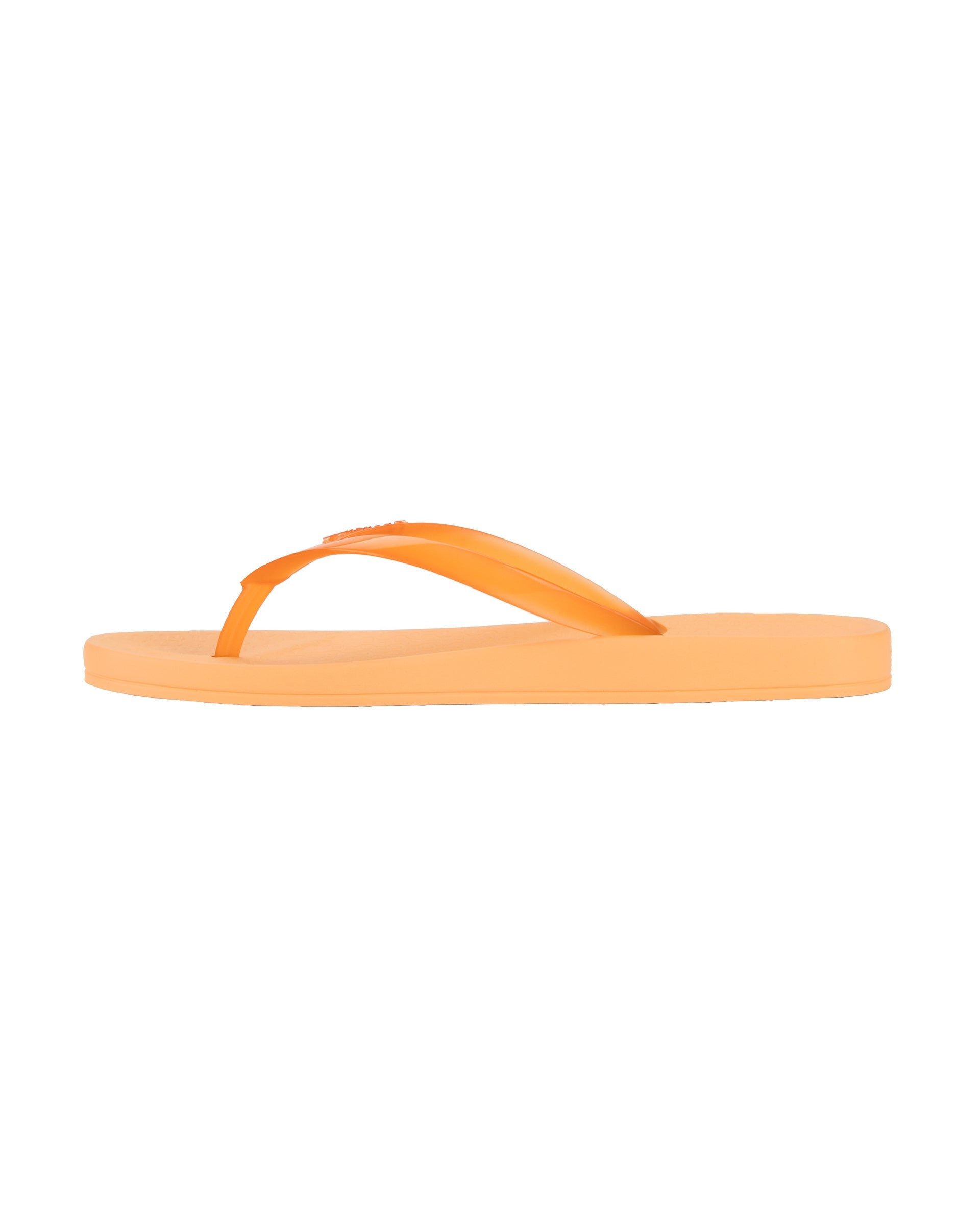 Inner side view of a orange Ipanema Ana Connect women's flip flop with a clear orange strap.