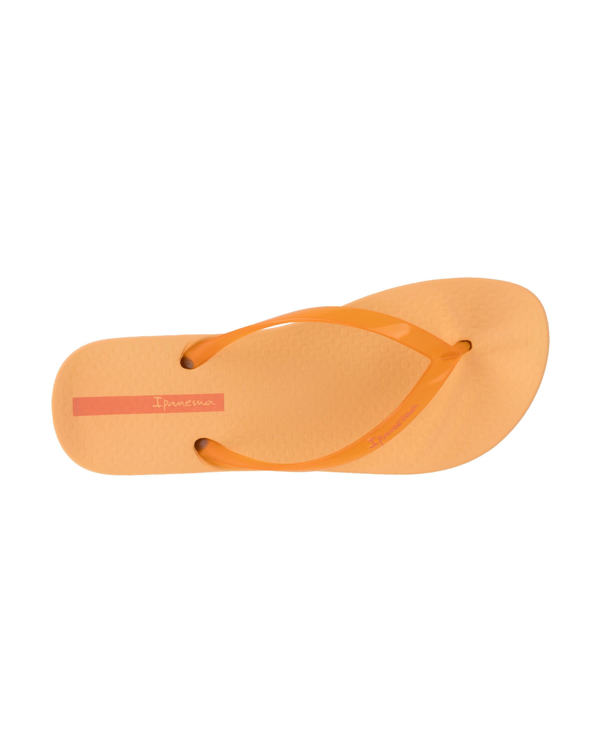 Top view of a orange Ipanema Ana Connect women's flip flop with a clear orange strap.