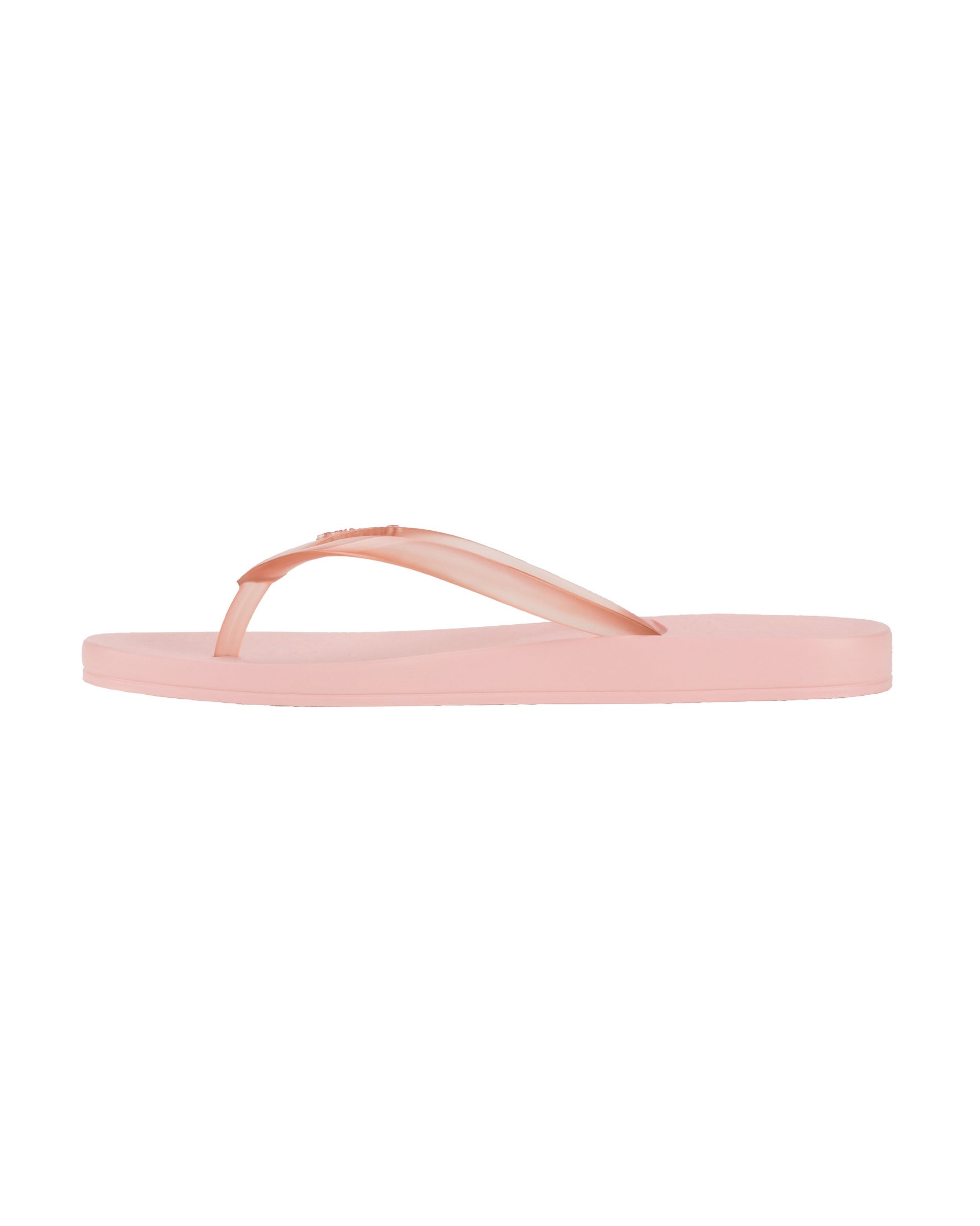 Inner side view of a pink Ipanema Ana Connect women's flip flop with a clear pink strap.