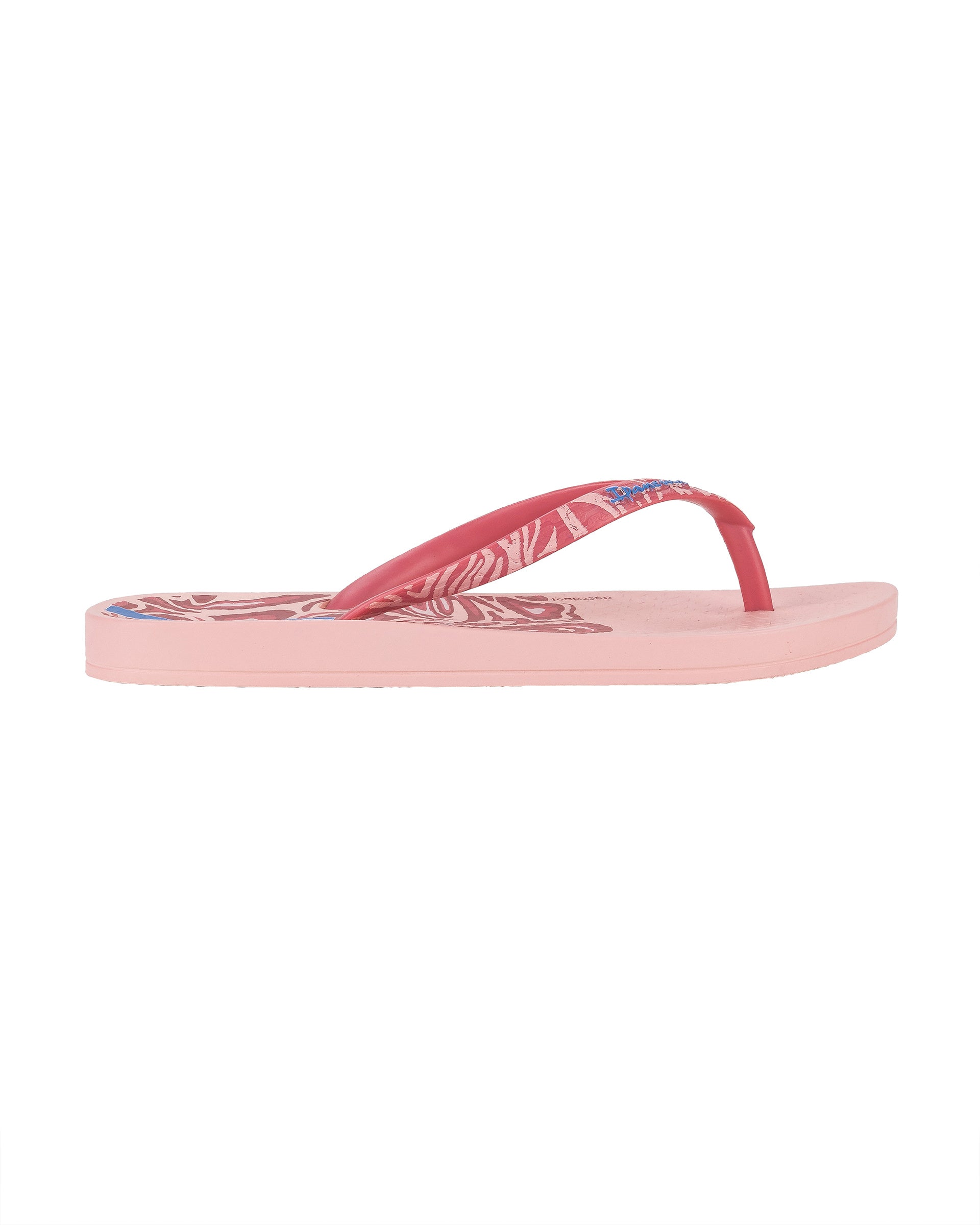 Outer side view of a light pink Ipanema Nostalgic Hearts kid's flip flop with heart outlines on insole and strap.