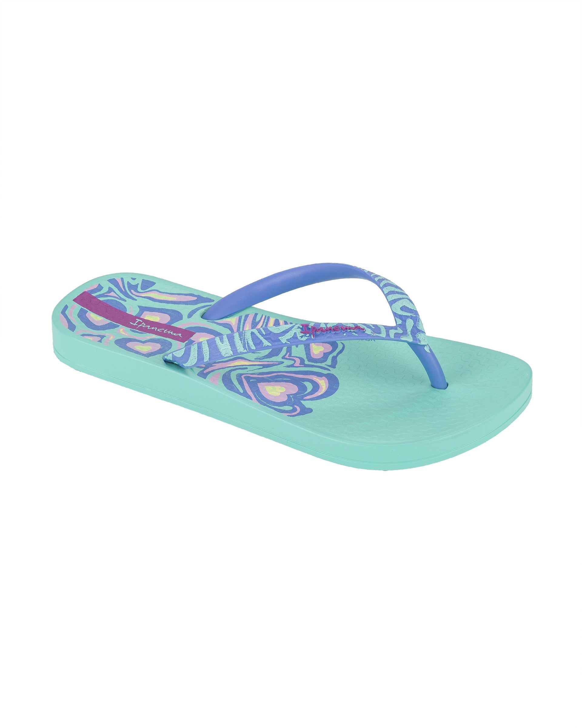 Angled view of a green Ipanema Nostalgic Hearts kid's flip flop with heart outlines on insole and blue strap.