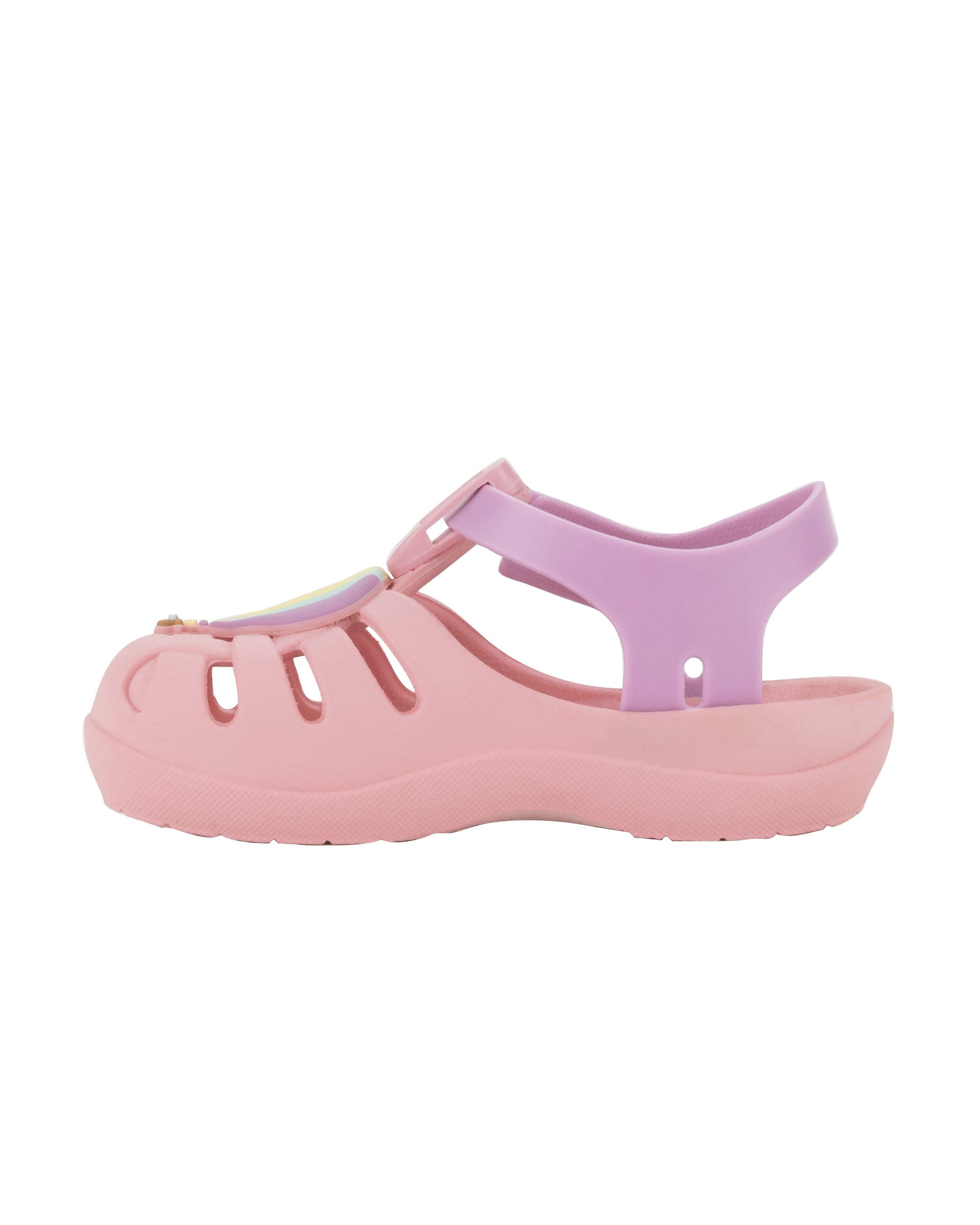 Inner side view of a pink Ipanema Summer baby sandal with hot air balloon on the upper.