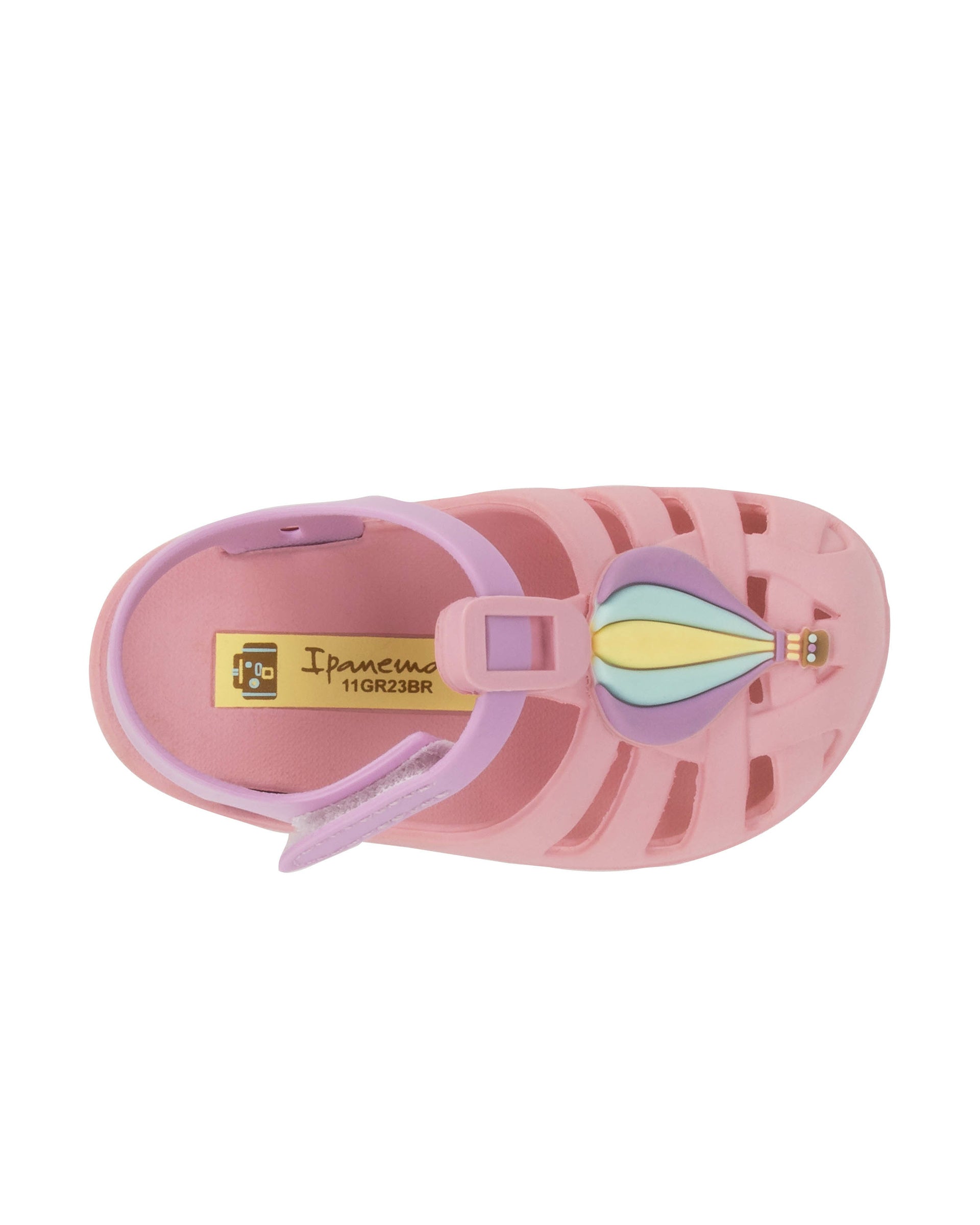 Top view of a pink Ipanema Summer baby sandal with hot air balloon on the upper.