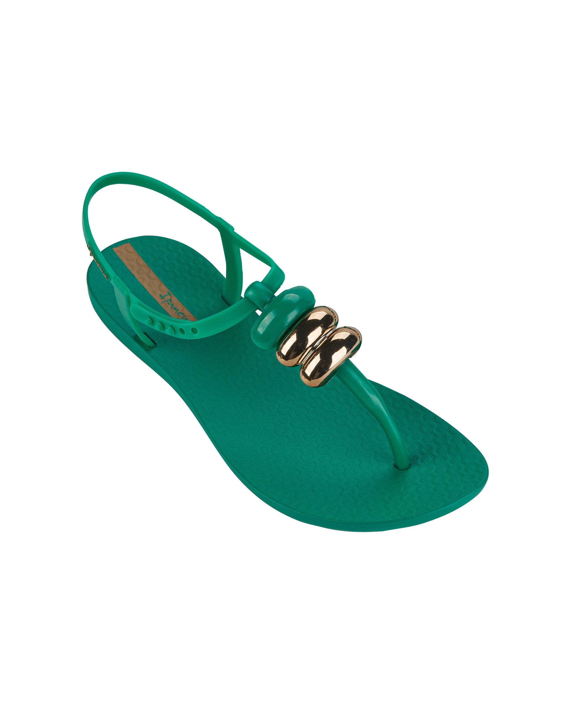 Angled view of a green Ipanema Class women's sandal with 3 bubble baubles on the t-strap.