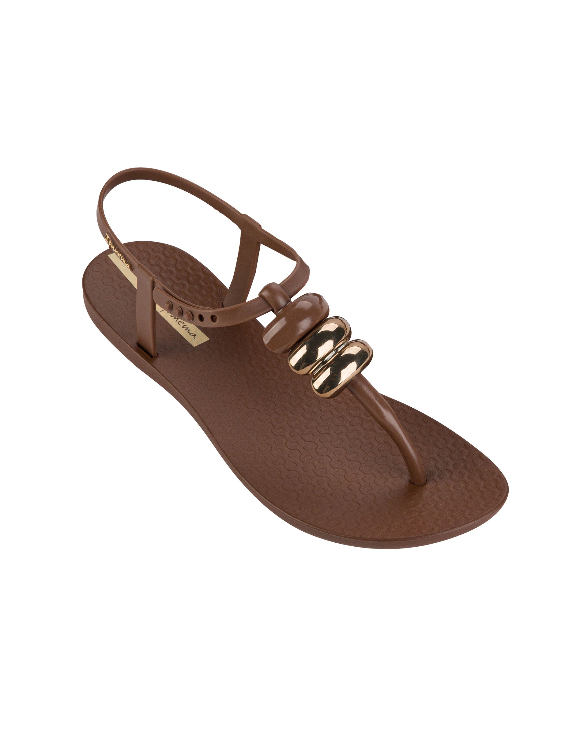 Angled view of a brown Ipanema Class women's sandal with 3 bubble baubles on the t-strap.