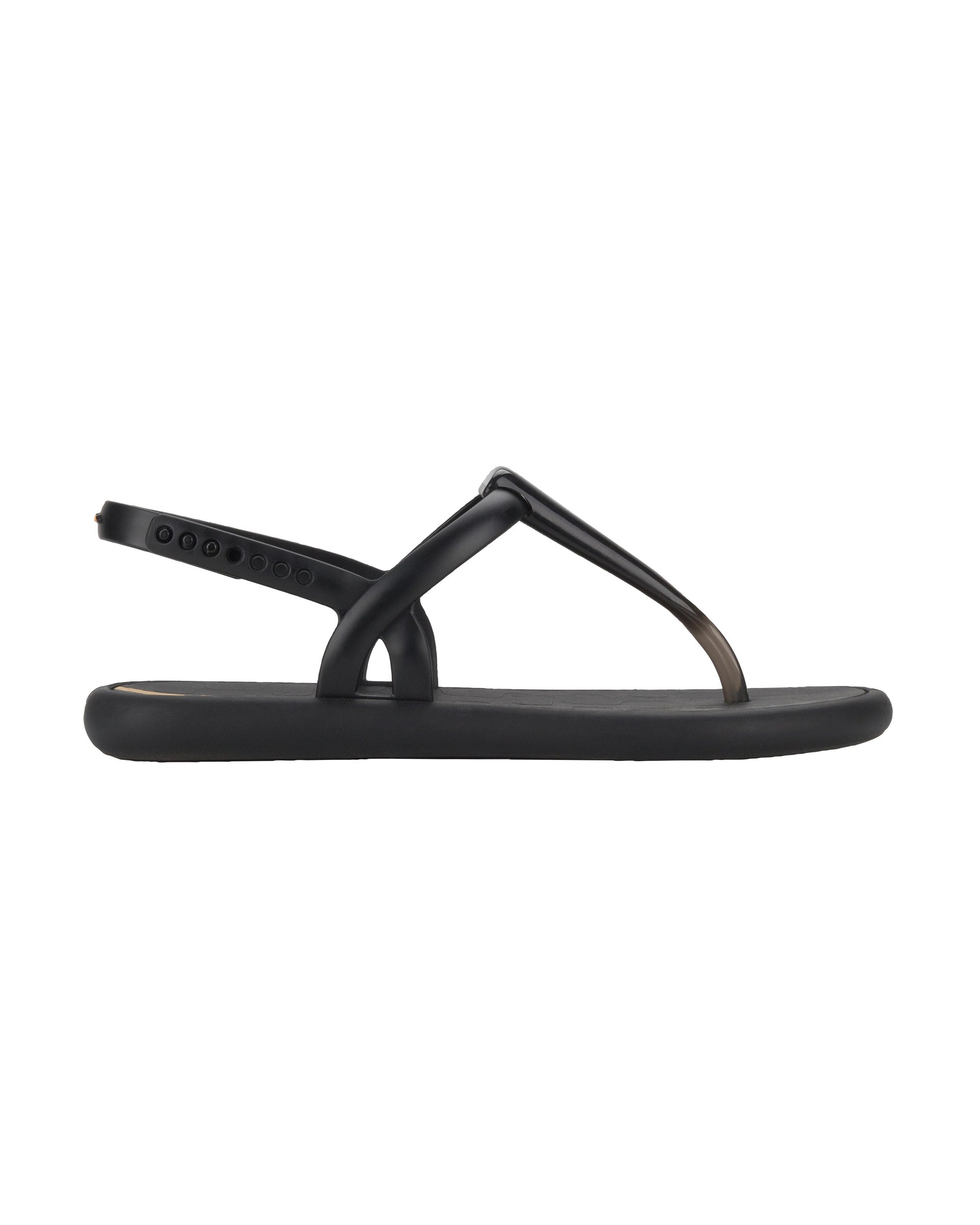 Outer side view of a black Ipanema Glossy women's t-strap sandal.