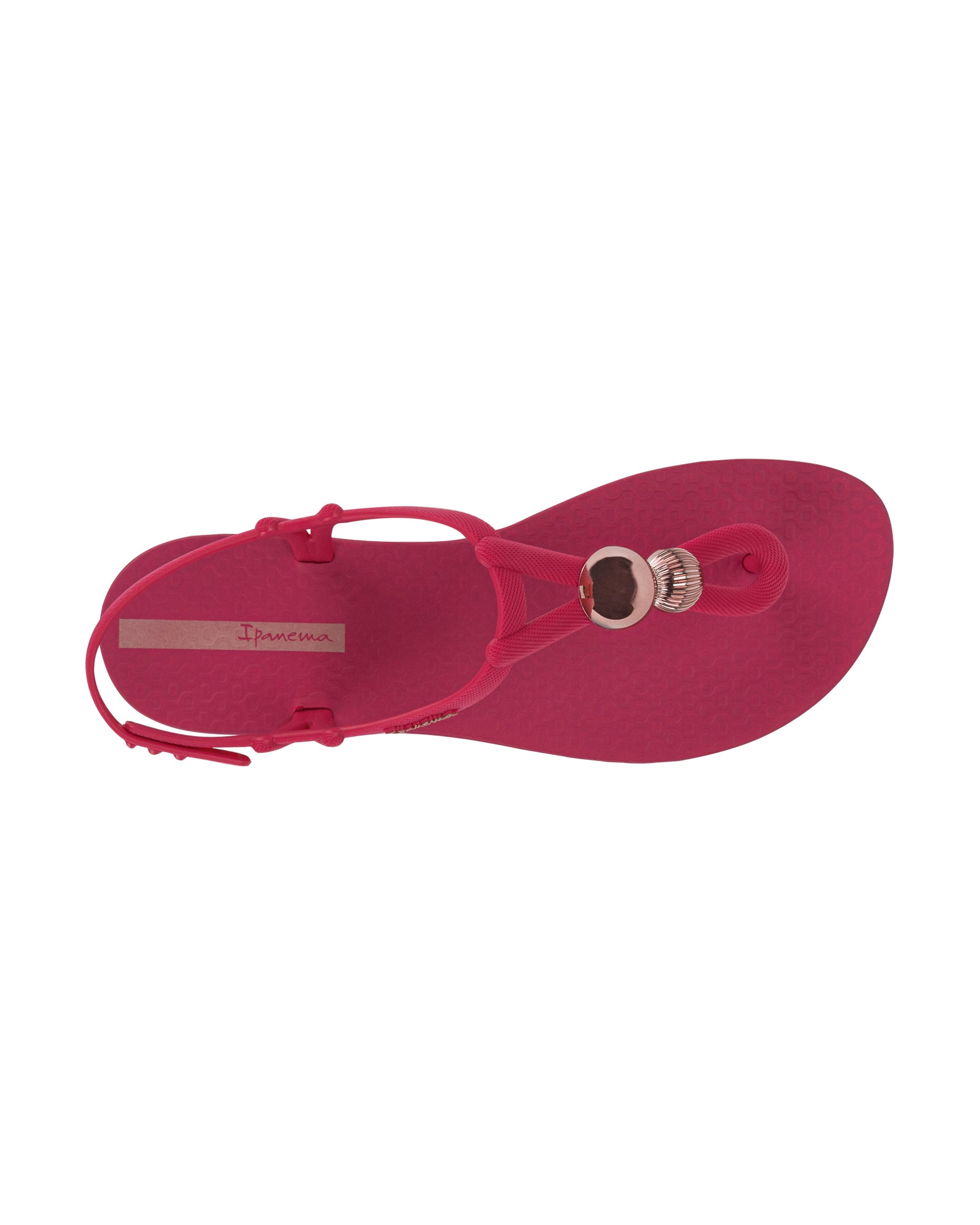 Top view of a pink Ipanema Class Spheres women's t-strap sandal with metallic bauble.