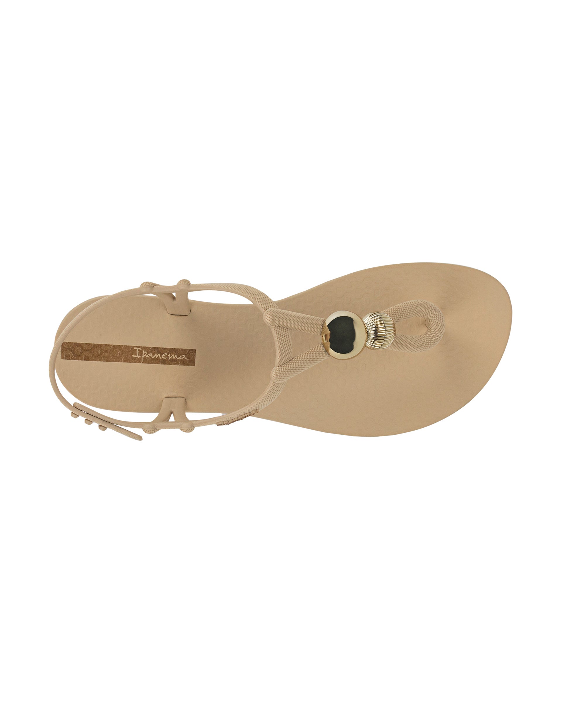 Top view of a beige Ipanema Class Spheres women's t-strap sandal with metallic bauble.