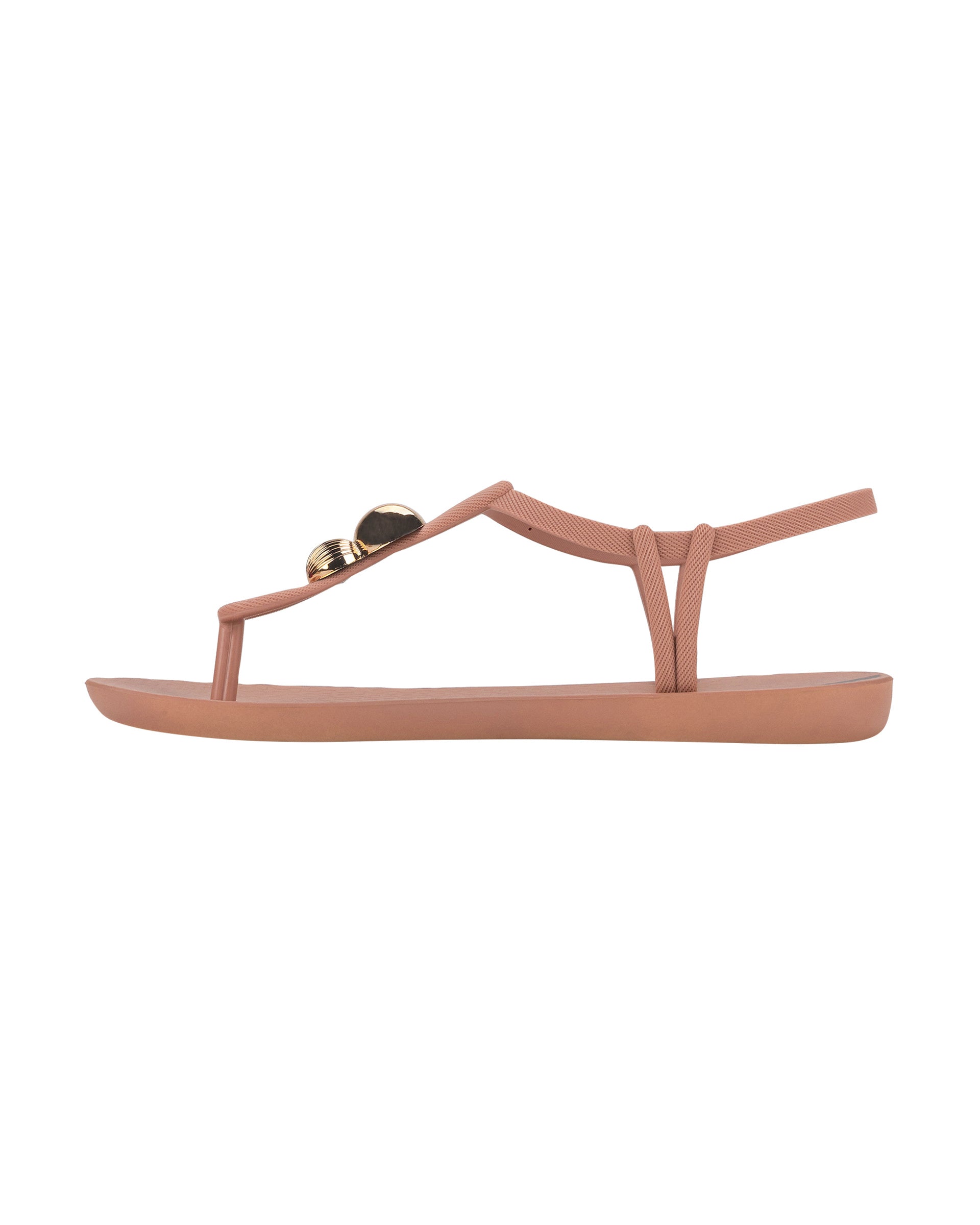 Inner side view of a light pink Ipanema Class Spheres women's t-strap sandal with metallic bauble.